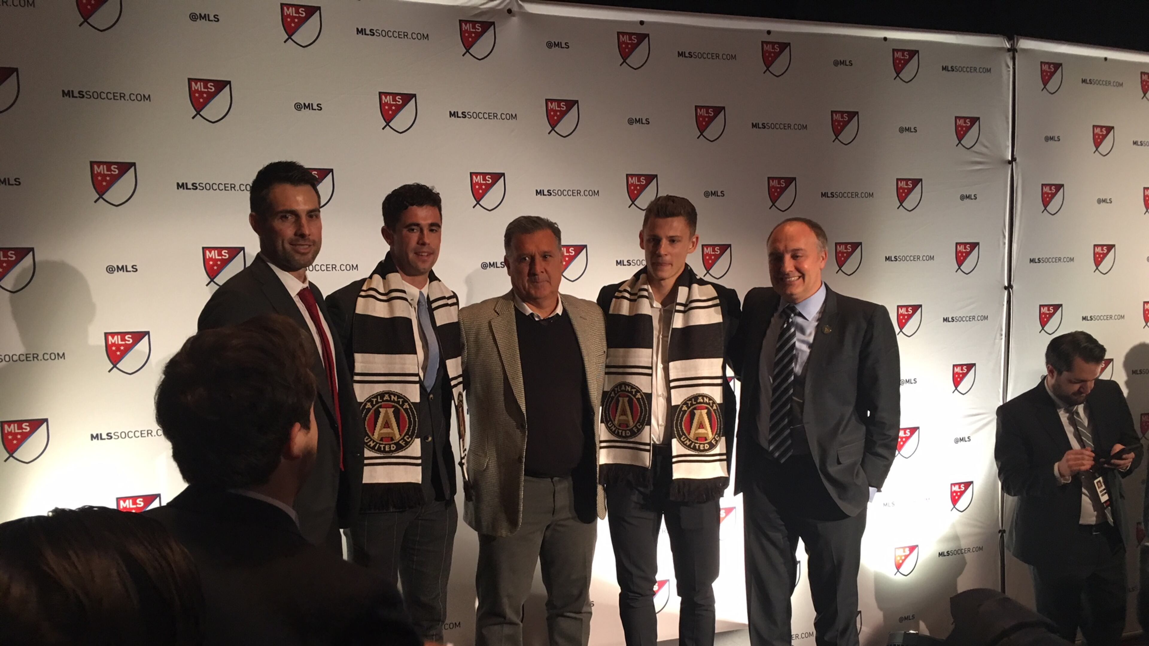 Atlanta United Technical Director Carlos Bocanegra, Oliver Shannon, Gerardo Martino, Gordon Wild and President Darren Eales post at the SuperDraft on Friday in Philadelphia.