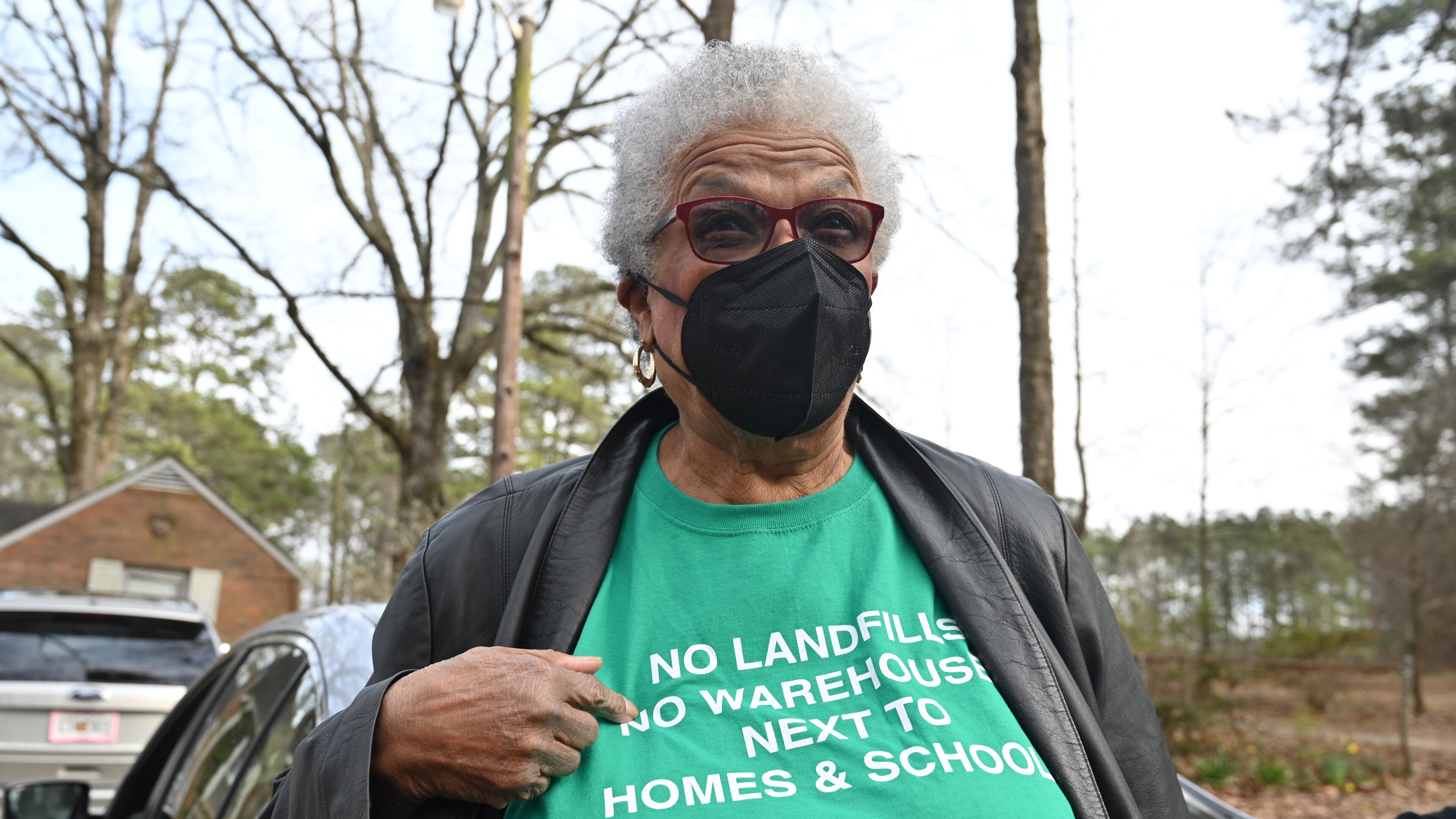 Former City of South Fulton Councilwoman Naeema Gilyard wearing a t-shirt discusses about an illegal landfill and raising concerns about air pollution levels, Friday, Feb. 10, 2023, in Fairburn. For years, former City of South Fulton Councilwoman Naeema Gilyard and other neighbors have been concerned about breathing smoke from the landfill, not to mention emissions from the steady stream of diesel big rigs that coming and going from warehouses that line South Fulton Parkway. Even with modern engines and cleaner fuel, exhaust from diesel trucks is known to contain a dangerous cocktail of air pollutants. (Hyosub Shin / Hyosub.Shin@ajc.com)