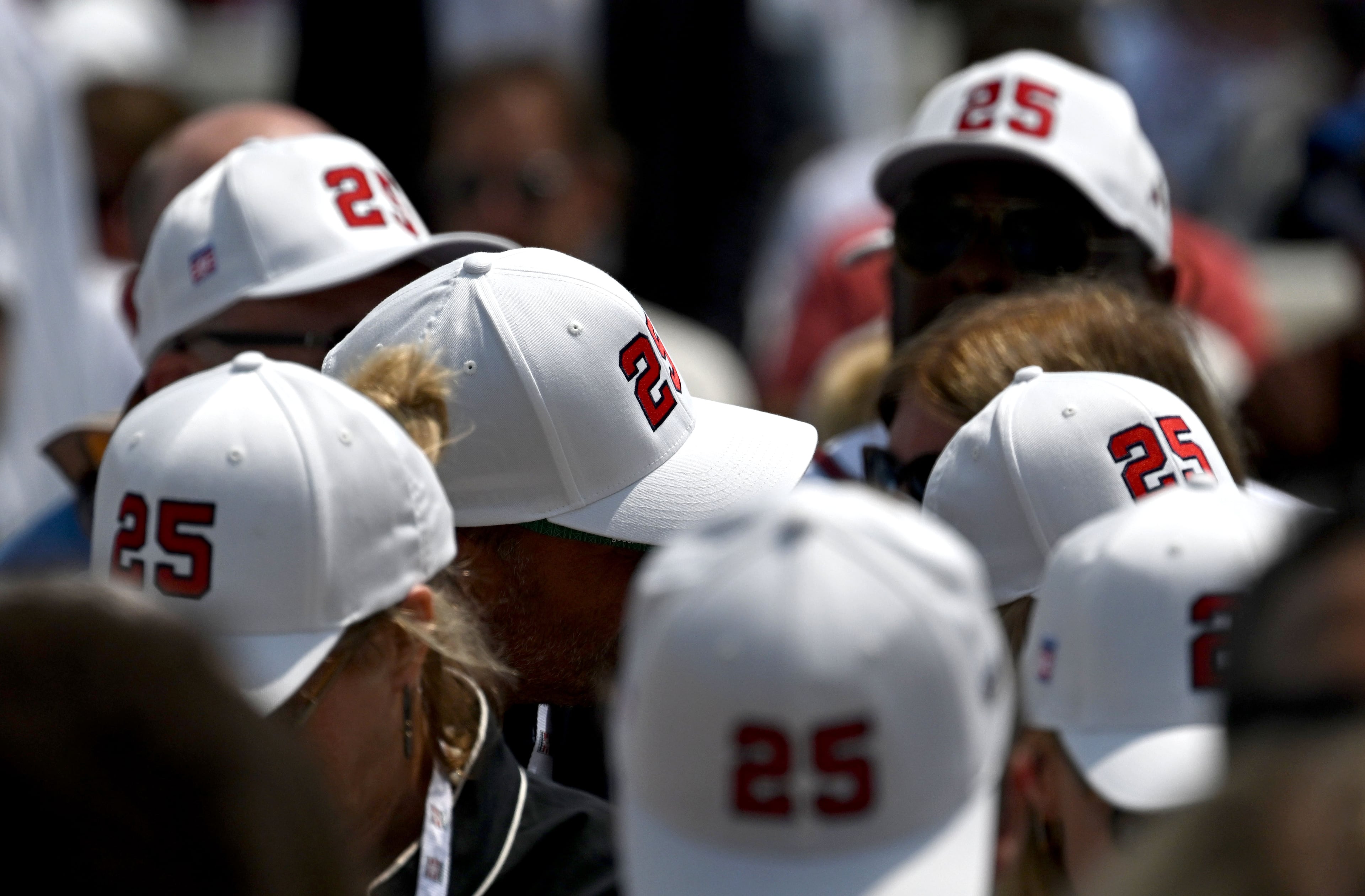 Baseball fans wearing Atlanta Braves No. 25 hats to support Andruw Jones before the 2026 National Baseball Hall of Fame Induction Ceremony at the Clark Sports Center on Sunday, July 26, 2026, in Cooperstown, N.Y. Braves centerfielder Andruw Jones is set for induction into the National Baseball Hall of Fame as part of the Class of 2026, alongside Carlos Beltrán and Jeff Kent. (Hyosub Shin/AJC)
