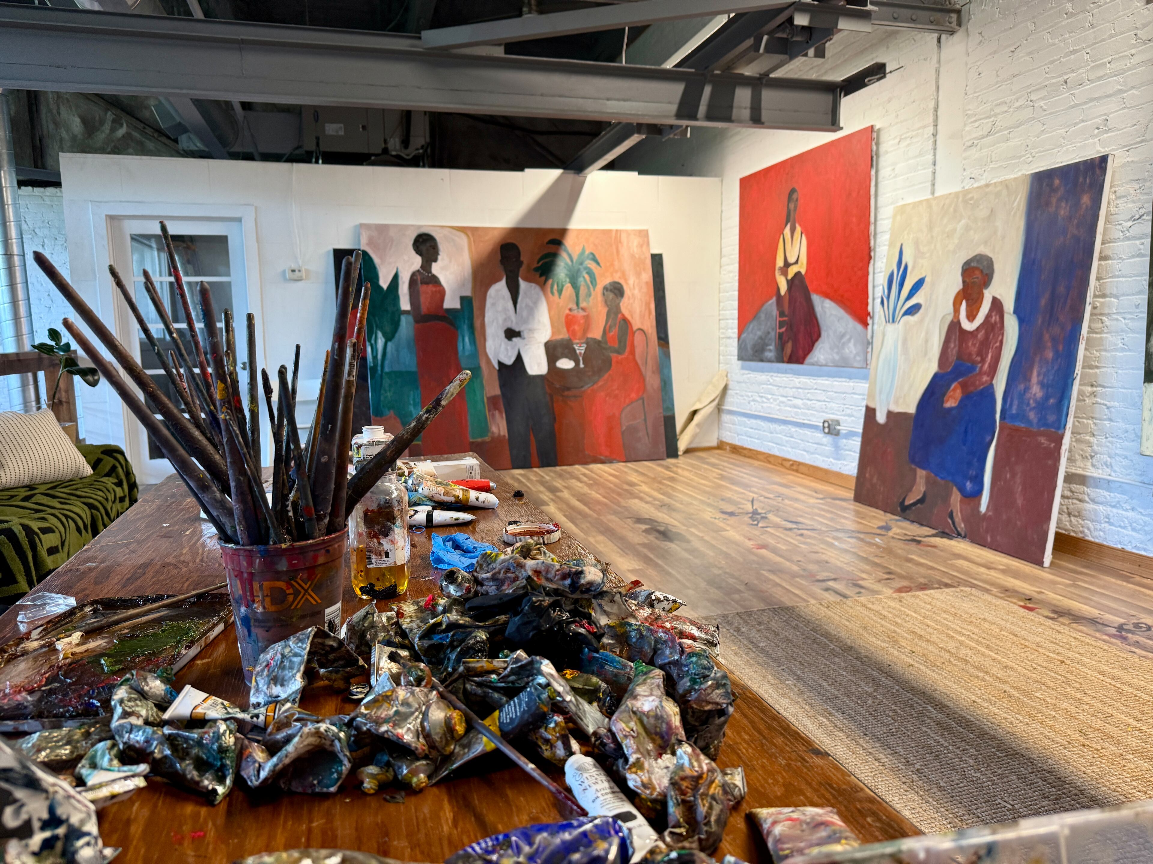The lofted space inside Patrick Eugène's new studio inside an old factory building at Goat Farm Arts Center. (Danielle Charbonneau/AJC)