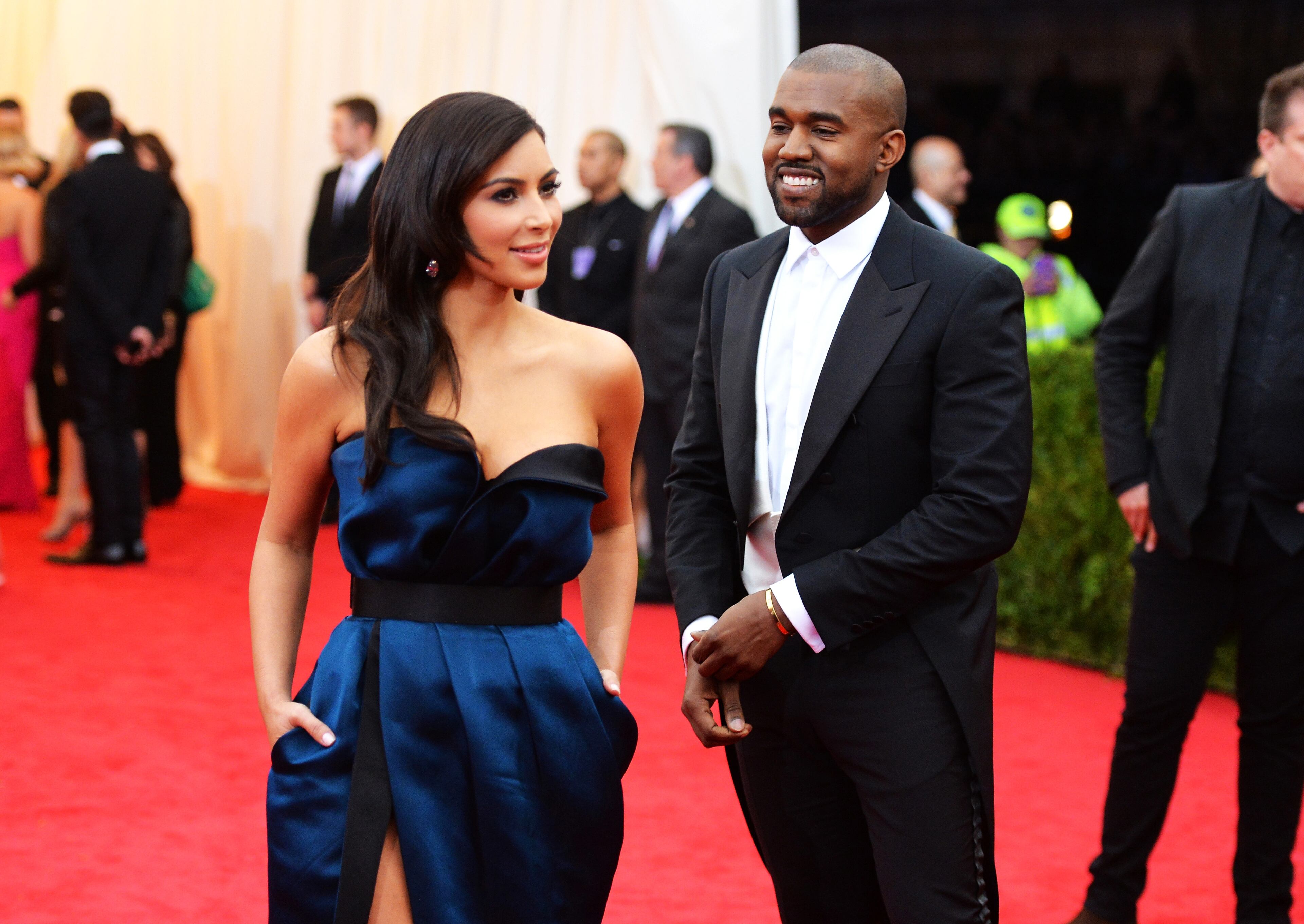 NEW YORK, NY - MAY 05: Kim Kardashian (L) and Kanye West attend the "Charles James: Beyond Fashion" Costume Institute Gala at the Metropolitan Museum of Art on May 5, 2014 in New York City. (Photo by Mike Coppola/Getty Images)