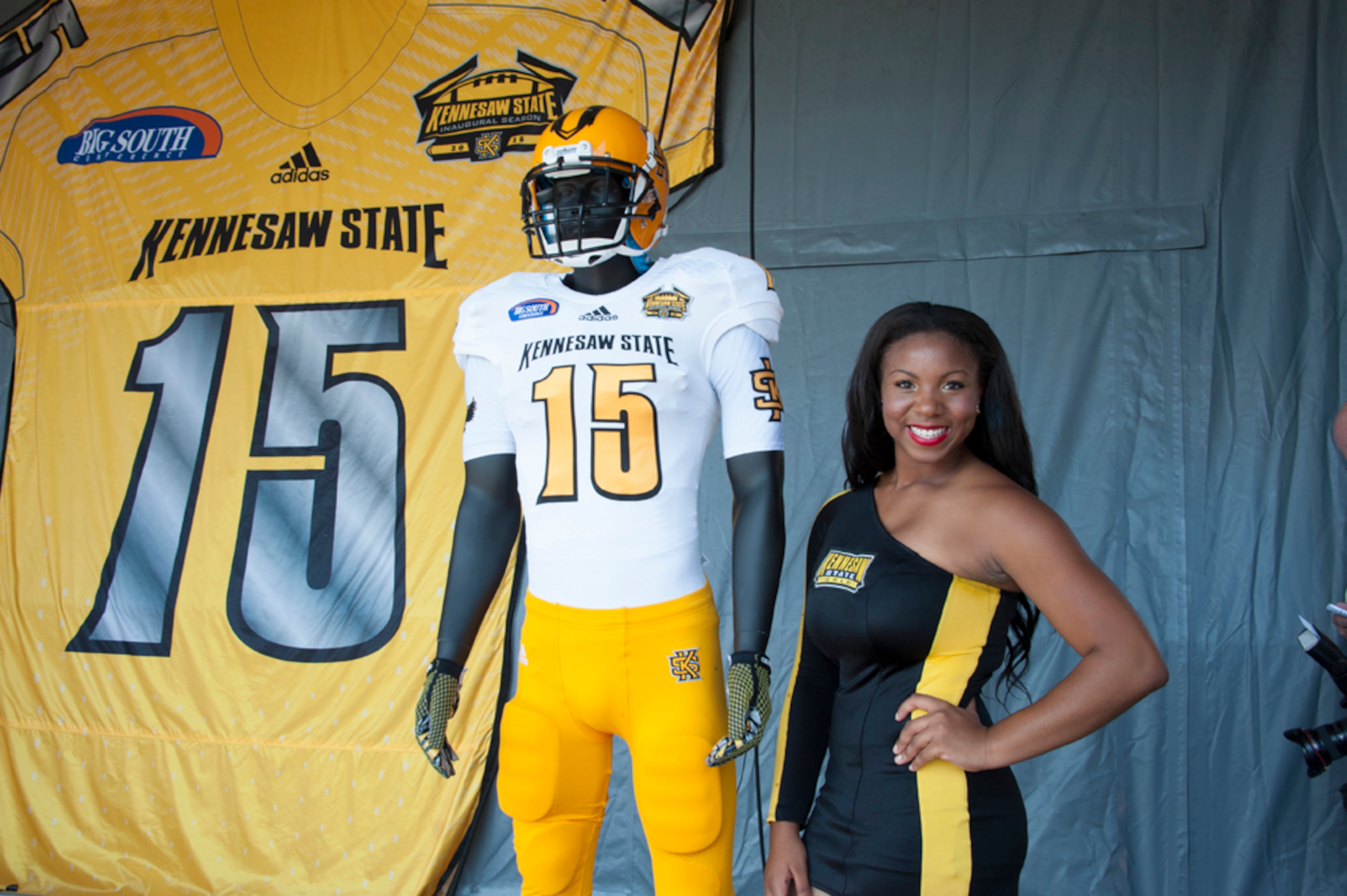 The Owls' uniform ensemble also includes a white jersey with gold numbers outlined in black. The team also has black, white and gold pants along with a gold helmet with black stripes and a gold "KS" insignia.