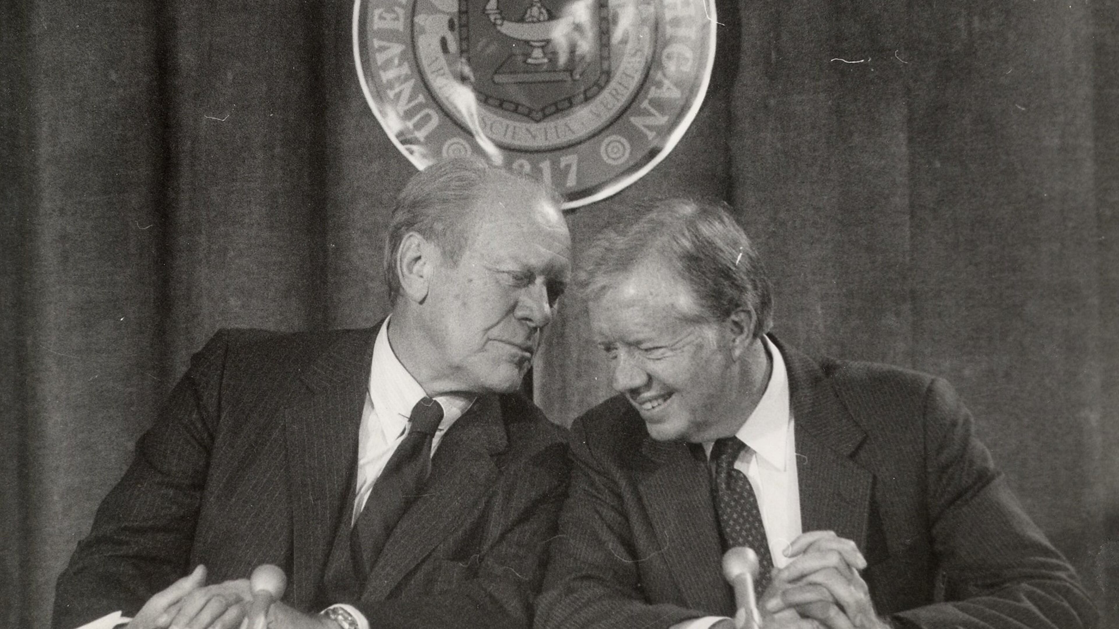 Former U.S. Presidents, Gerald Ford and Jimmy Carter, share a private moment in 1984. On Monday night, Carter won the 2017 Gerald R. Ford Medal for Distinguished Public Service (AP Photo/Detroit Free Press, Hugh Grannum) . On Monday night