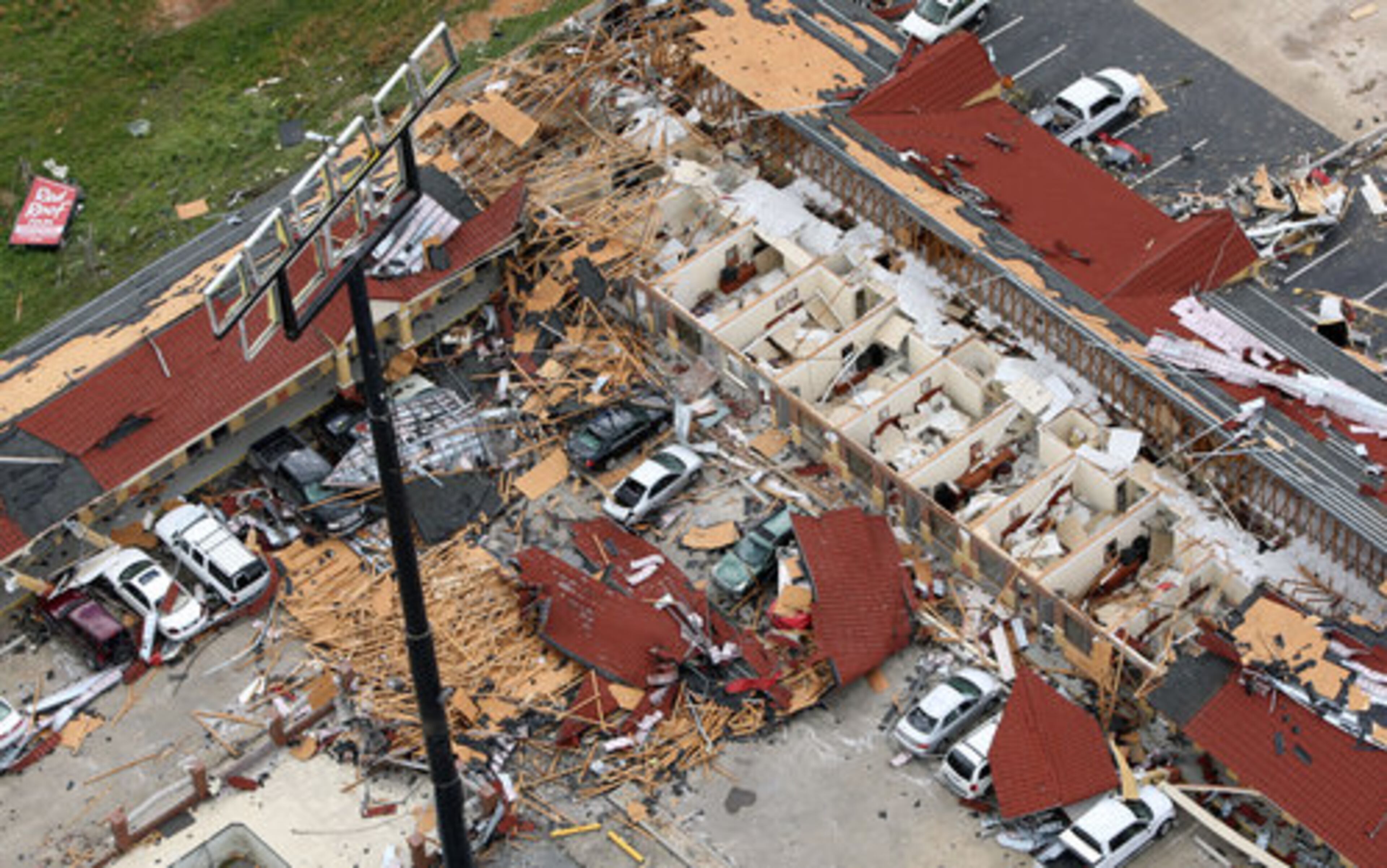 The roof of a Red Roof Inn was ripped off by the tornado.