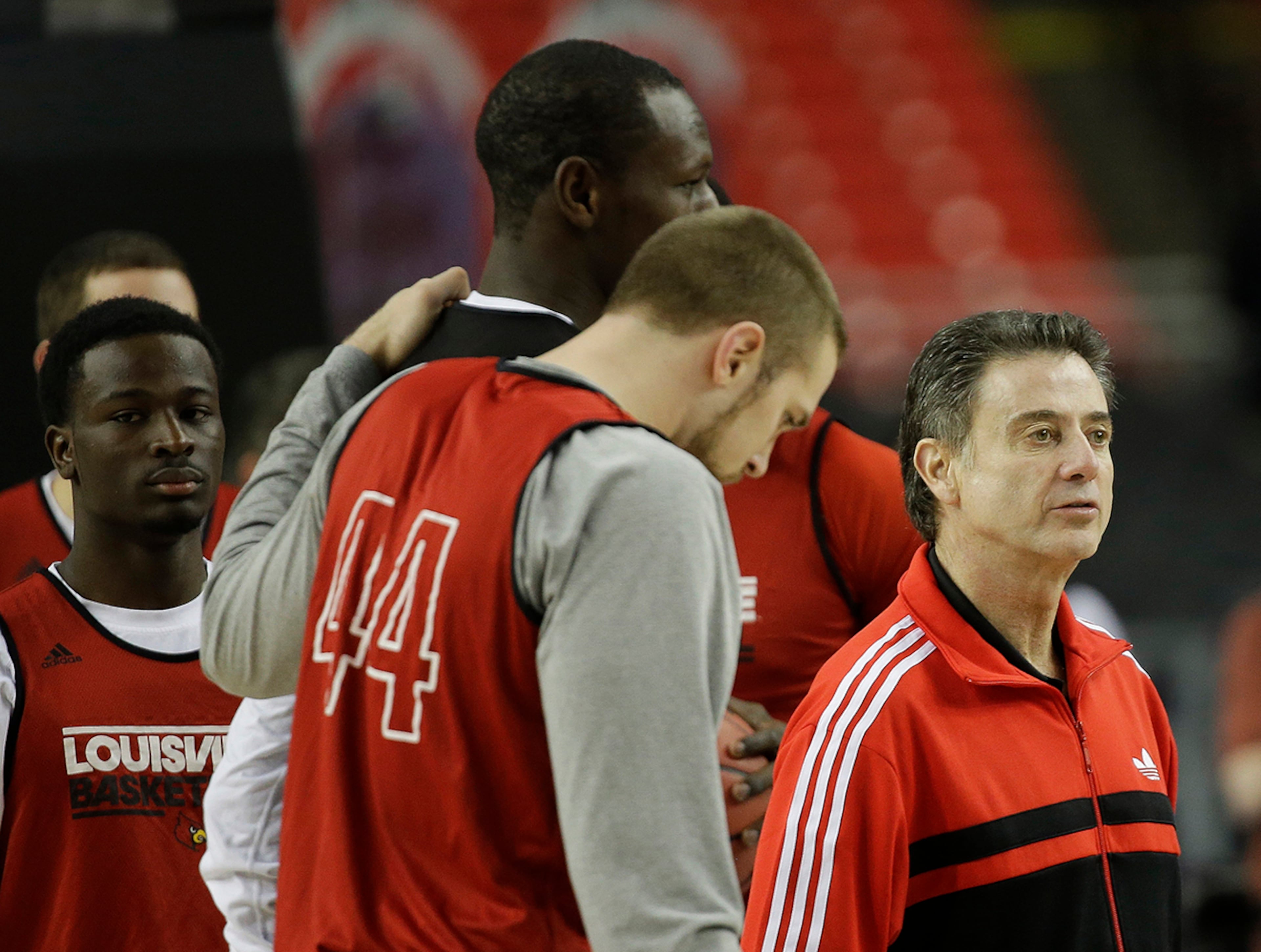Louisville head coach Rick Pitino speaks to his players during practice Friday at the Georgia Dome in Atlanta.