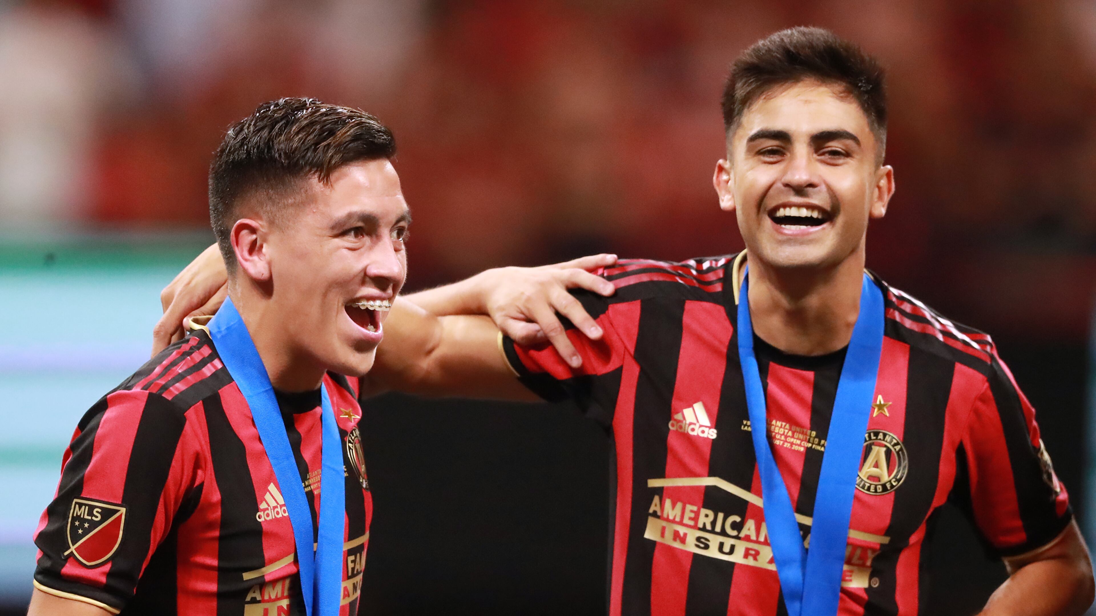 August 27, 2019 Atlanta: Atlanta United players Ezequiel Barco (left) and Pity Martinez celebrate beating Minnesota United 2-1 to win the U.S. Open Cup on Tuesday, August 27, 2019, in Atlanta. Curtis Compton/ccompton@ajc.com