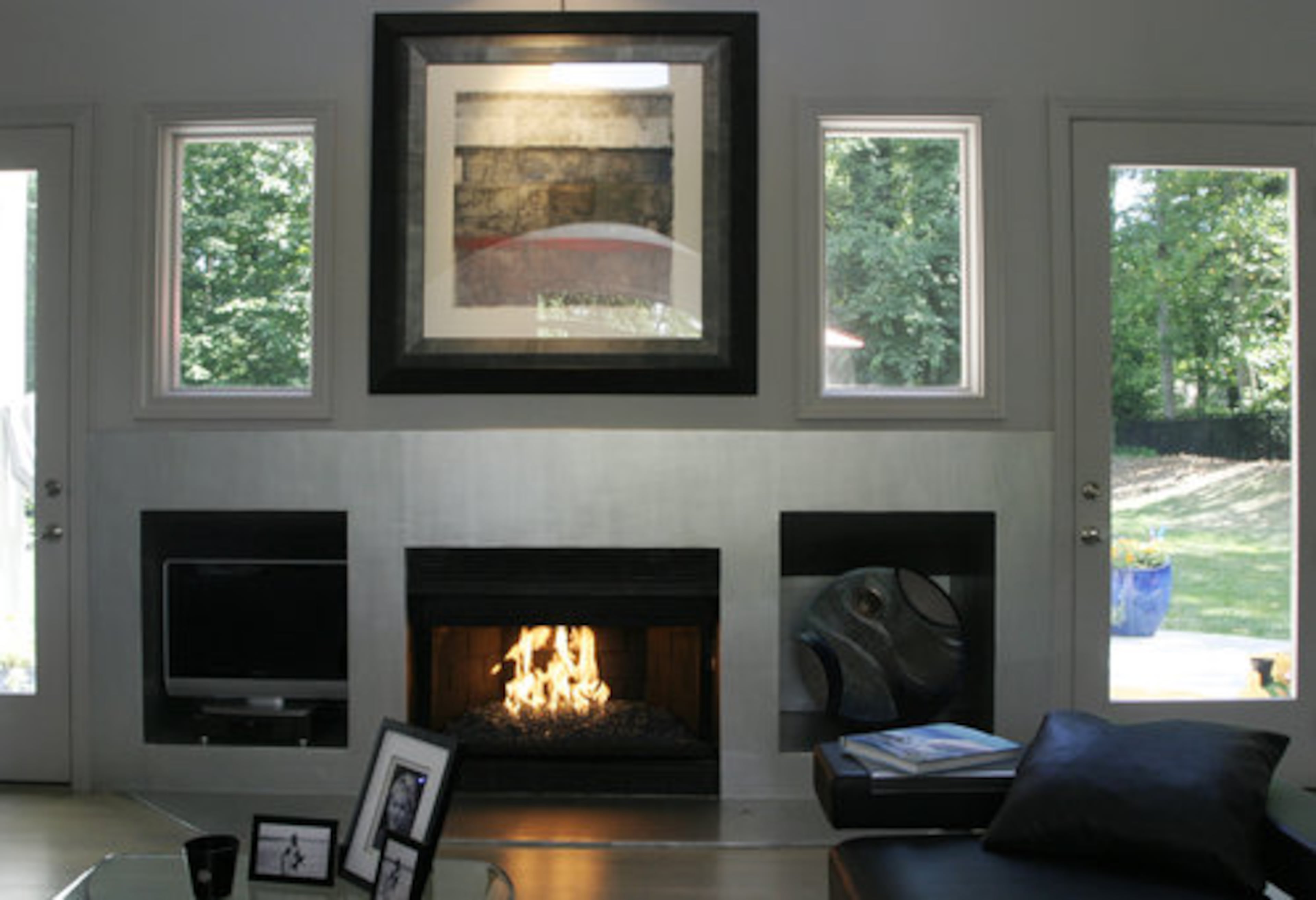 "Fire On Ice," tempered glass designed not to burn, is a product the Huffs use and sell. The glass pieces replace gas logs in the fireplace.