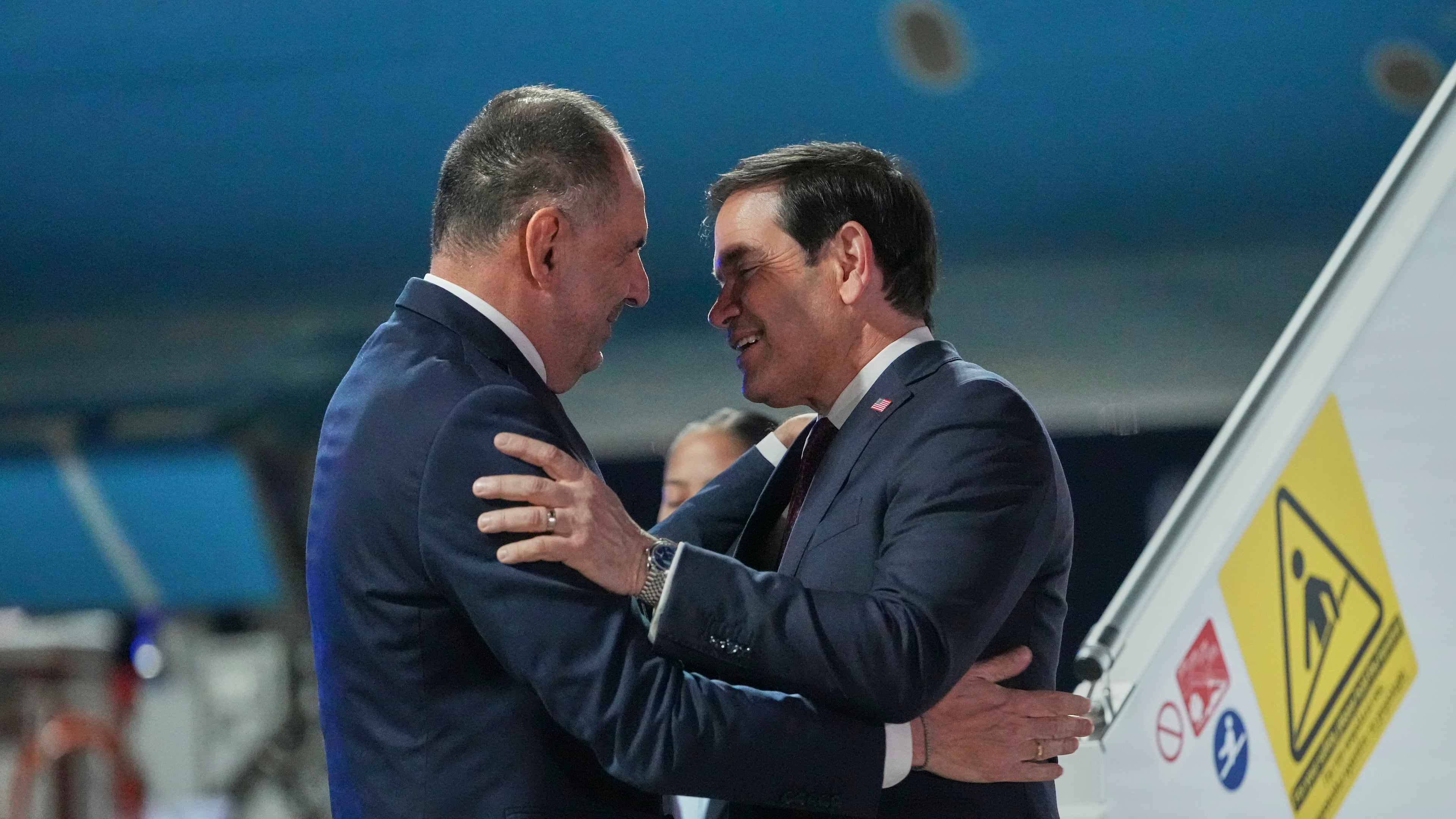 Greek Foreign Minister George Gerapetritis welcomes U.S. Secretary of State Marco Rubio, right, upon his arrival at Eleftherios Venizelos International Airport near Athens, Greece, Tuesday, Oct. 6, 2026. (AP Photo/Mark Schiefelbein, Pool)