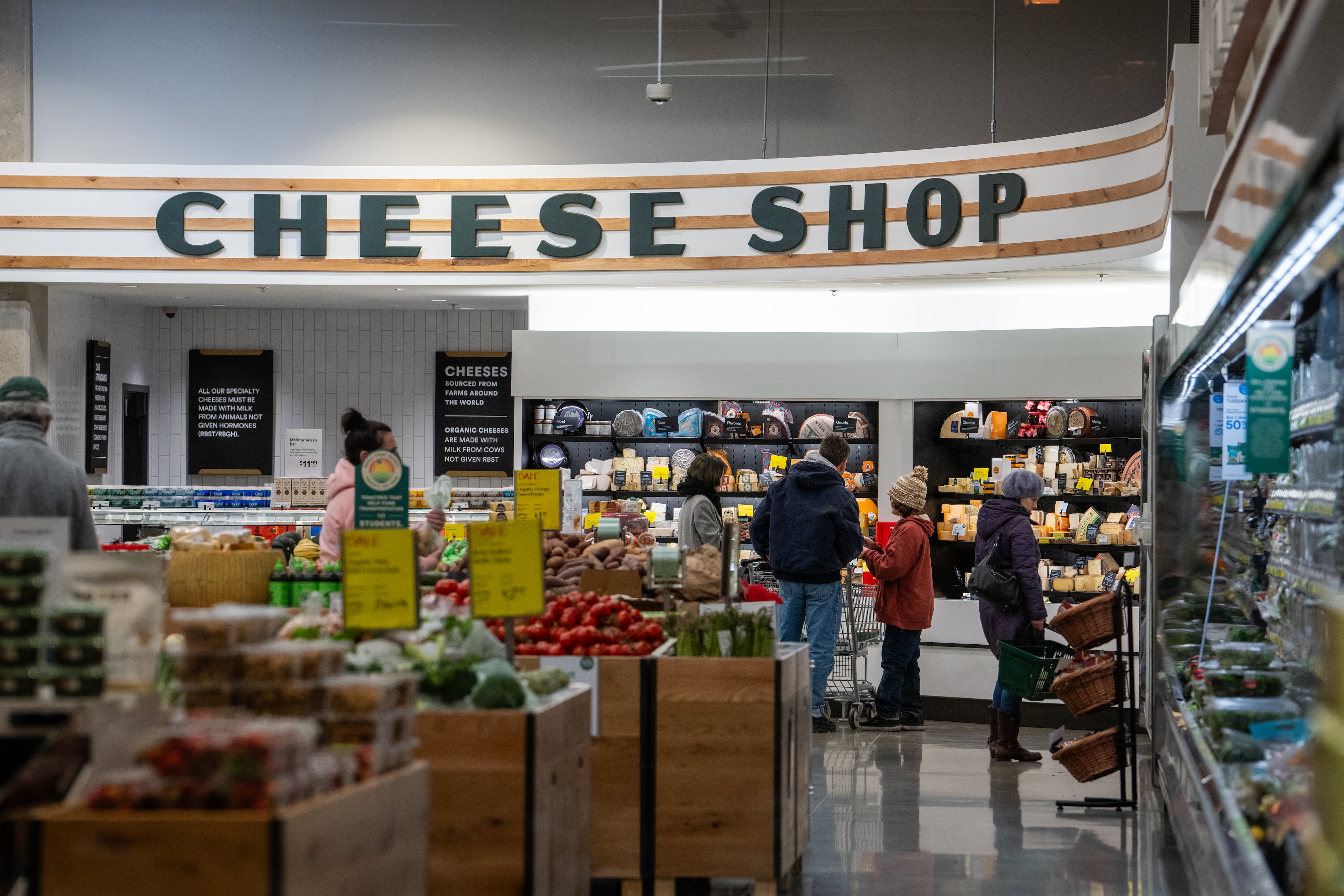 FILE — Shoppers at a Whole Foods in Falls Church, Va. on Feb. 17, 2025. Policy uncertainty and tariff whiplash are making consumers less confident about the economic outlook and more worried about inflation, new data from the University of Michigan showed on March 14, 2025. (Erin Schaff/The New York Times)