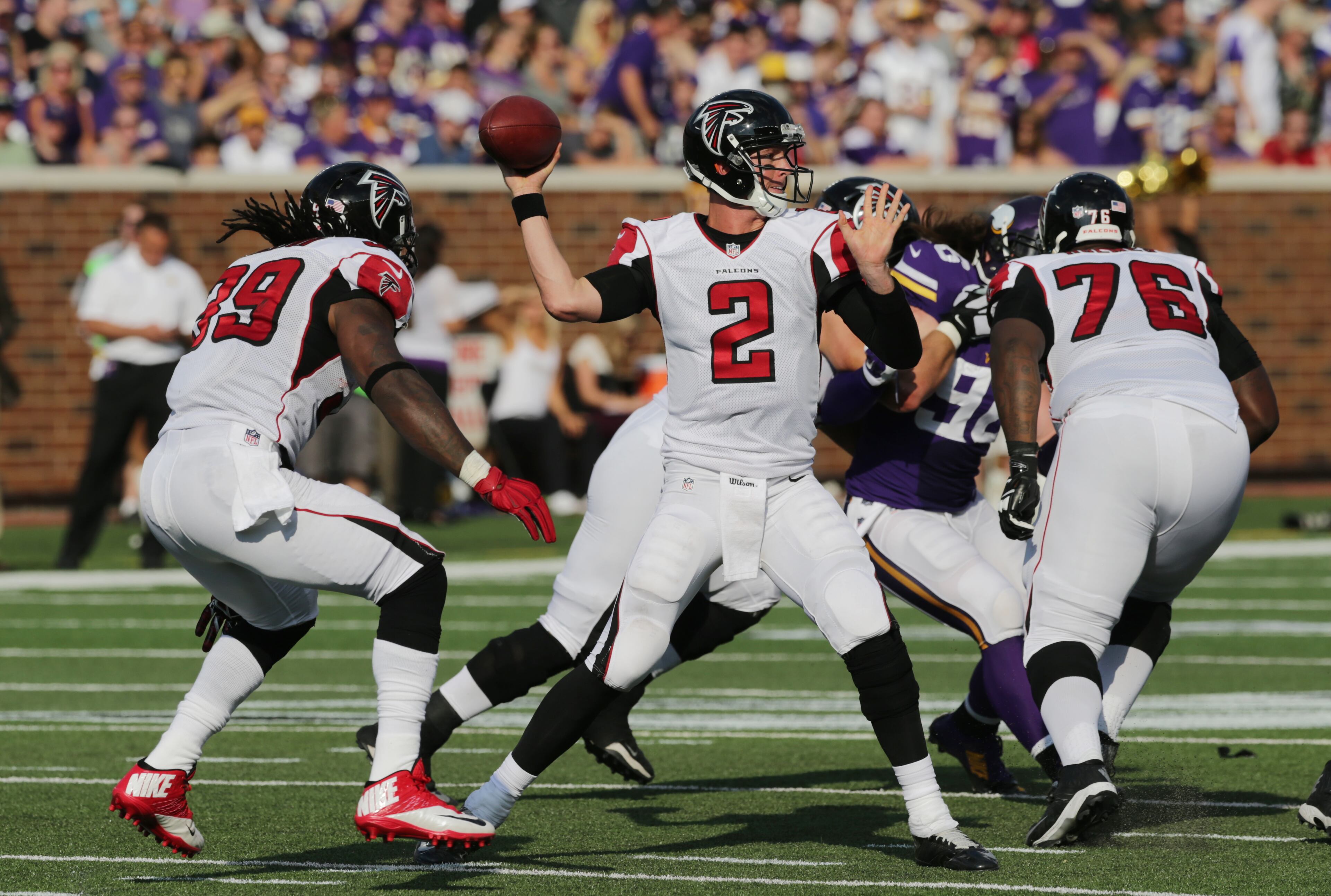 Atlanta Falcons quarterback Matt Ryan (2) throws a pass during the first half of an NFL football game against the Minnesota Vikings, Sunday, Sept. 28, 2014, in Minneapolis. (AP Photo/Jim Mone)