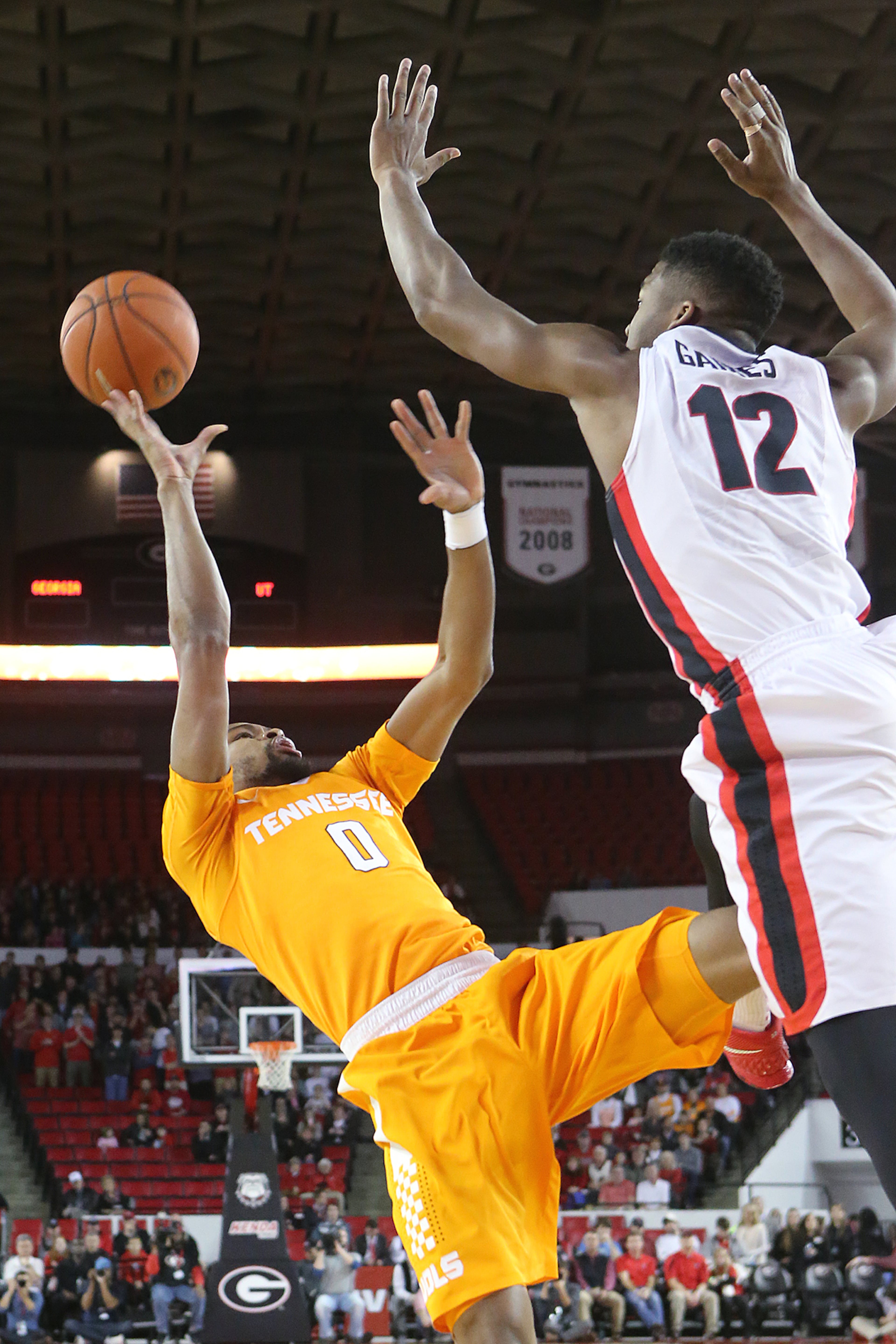 Georgia guard Kenny Gaines blocks a shot by Tennessee guard Kevin Punter in a basketball game on Wednesday, Jan. 13, 2016, in Athens. Georgia beat Tennessee 81-72. Curtis Compton / ccompton@ajc.com