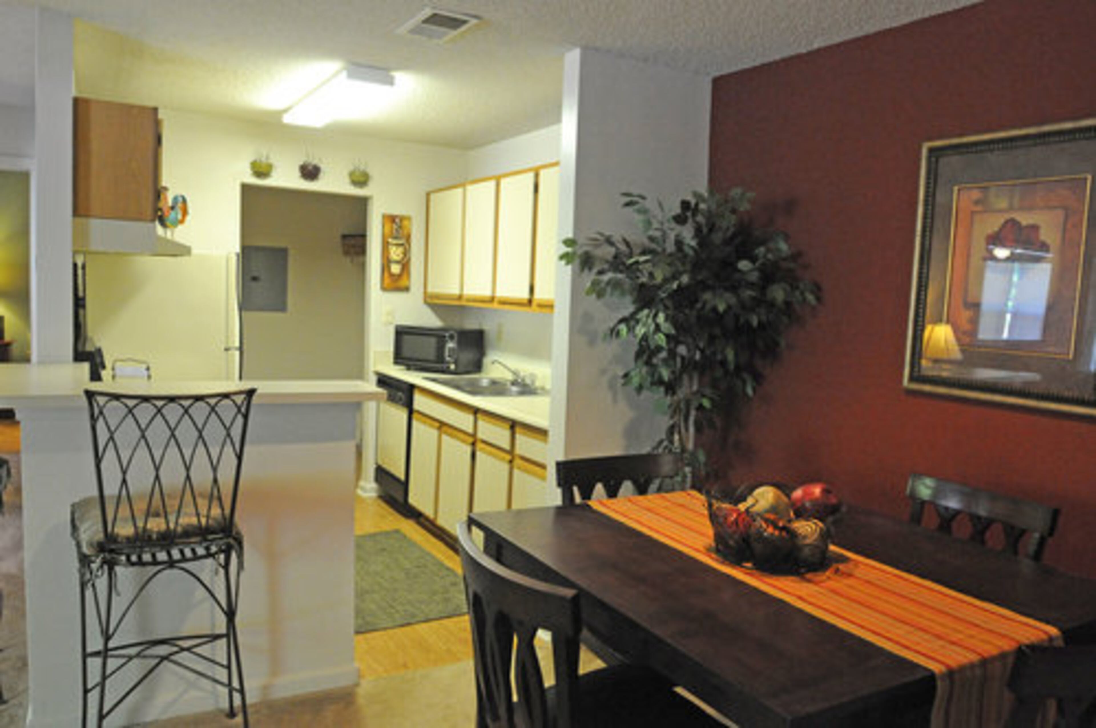The apartment's kitchen is spacious and is home for the washer and dryer as well. The patio is big enough to comfortably hold a table and chairs. Her apartment also comes with a garage, so Head just walks directly from the garage into her apartment.
