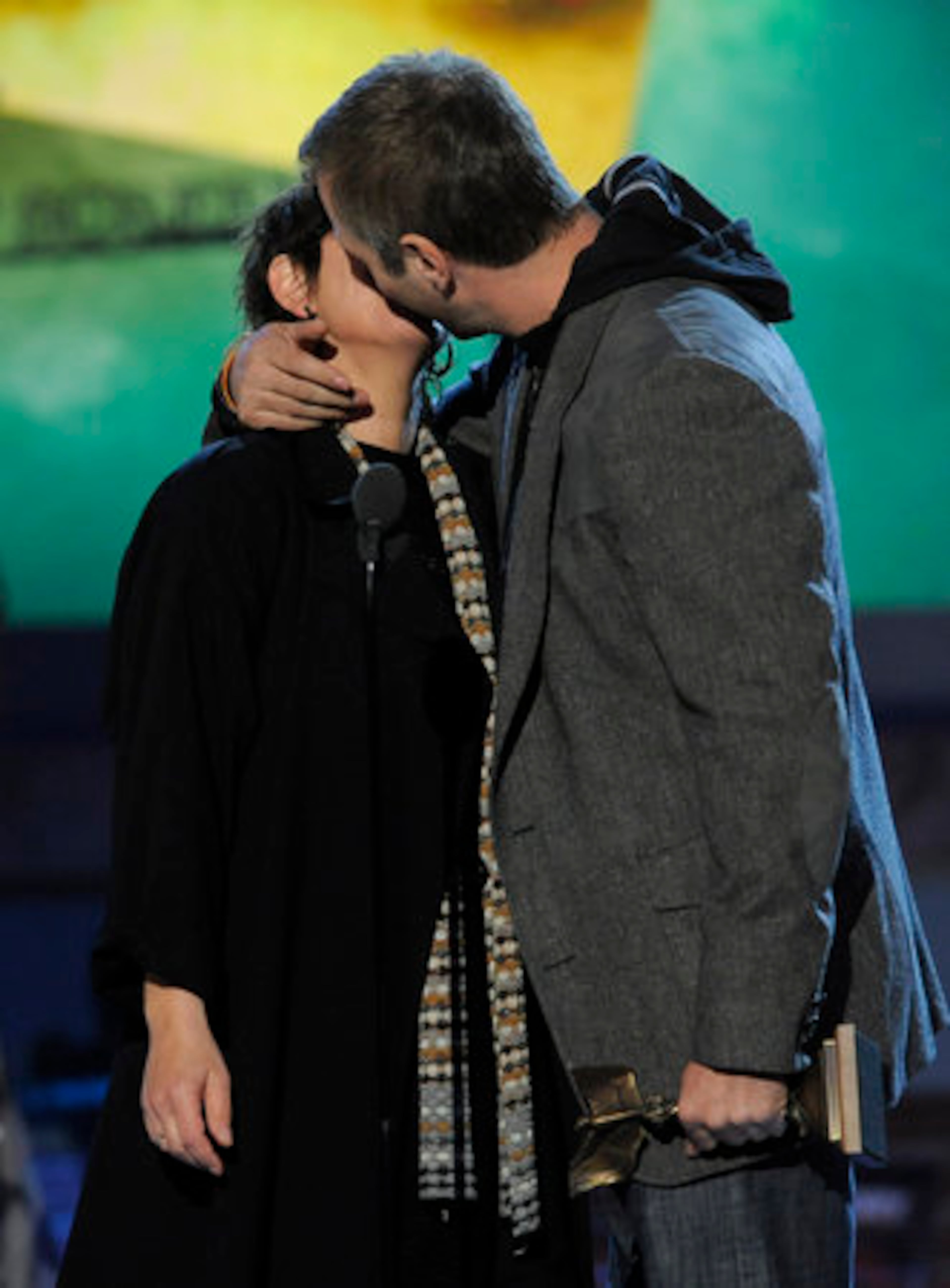Lisa Cholodenko, left, and Stuart Blumberg accept the award for best screenplay for "The Kids Are All Right."