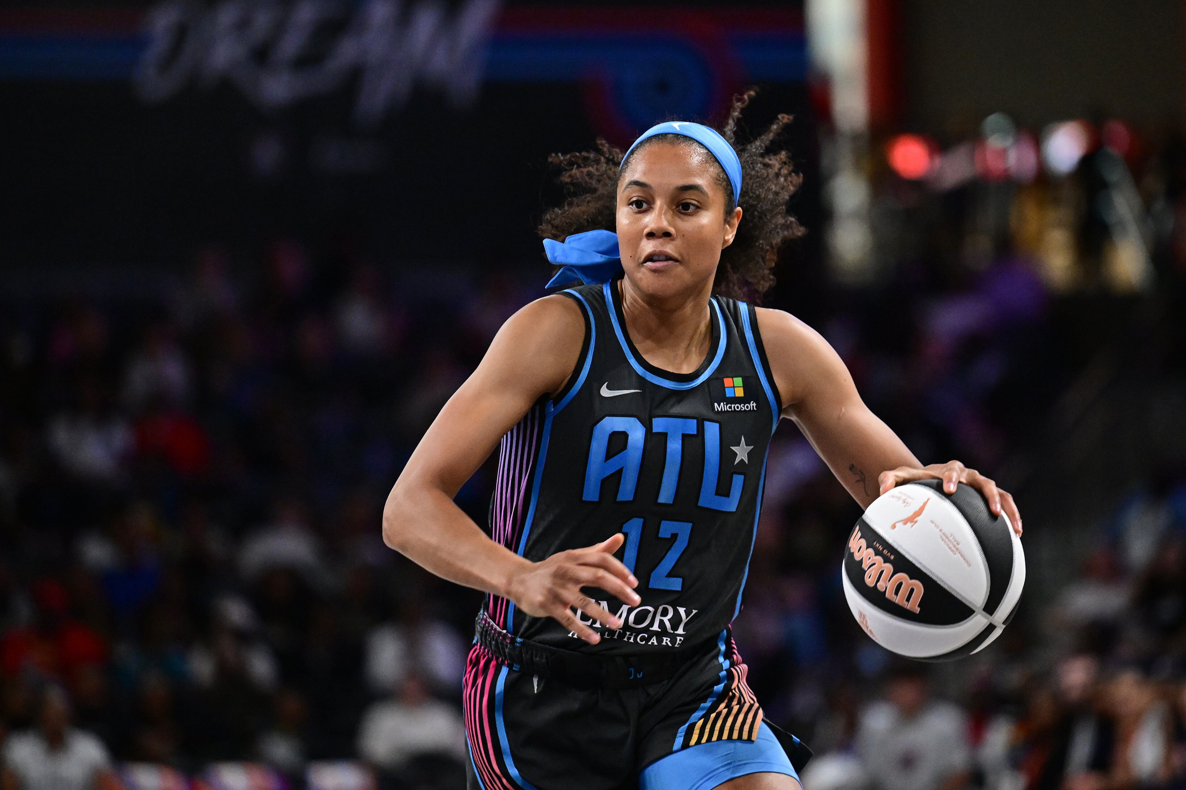 Nia Coffey of the Atlanta Dream handles the ball during the game against the Connecticut Sun during a 2024 Commissioner's Cup game on June 2, 2024 at Gateway Center Arena in College Park, Georgia. (Photo by Adam Hagy/NBAE via Getty Images)