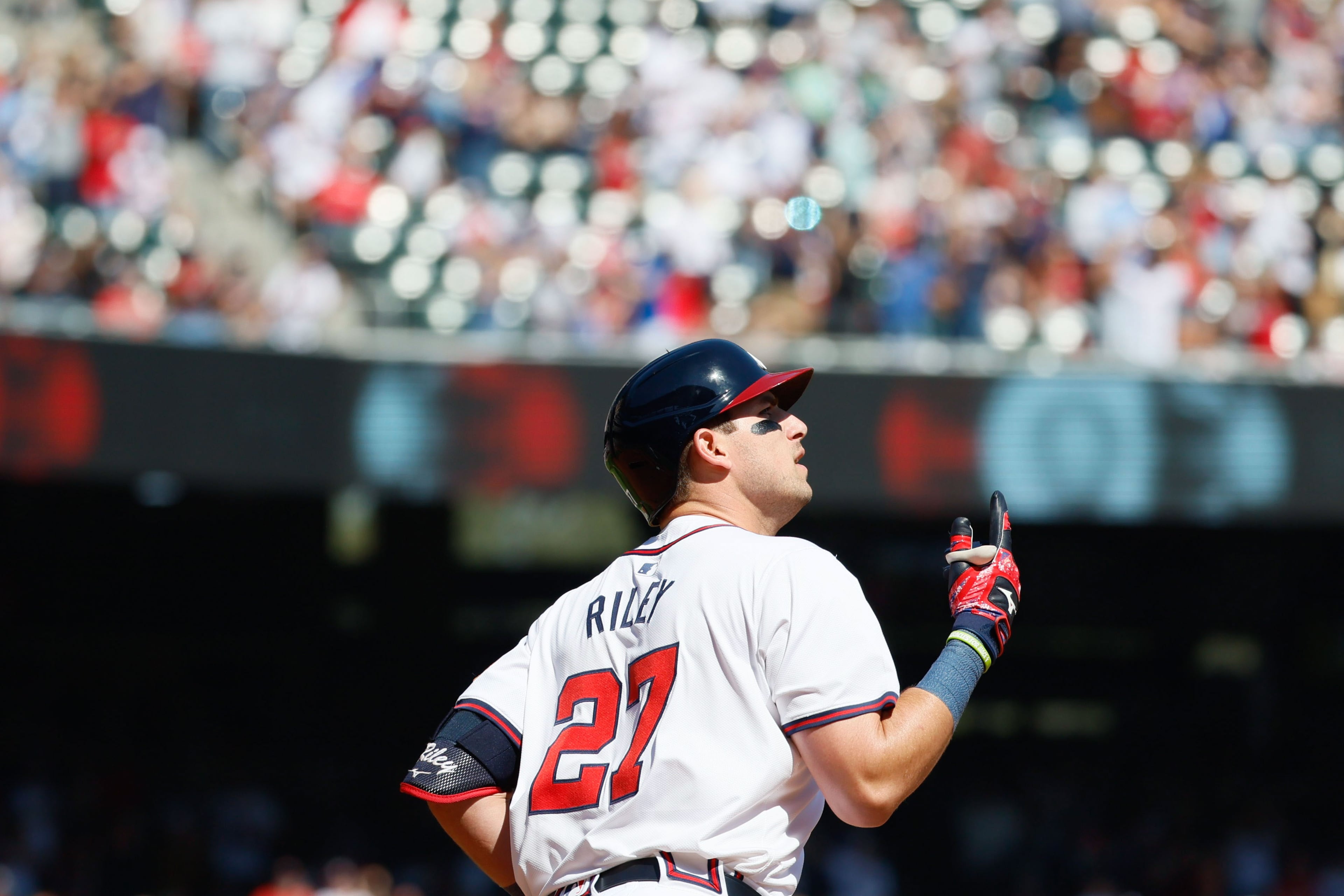 Atlanta Braves third baseman Austin Riley (27) watches his two-run home run as he rounds the bases during the eighth inning against the Arizona Diamondbacks at Truist Park on Sunday, April 7, 2024.
Miguel Martinez / miguel.martinezjimenez@ajc.com