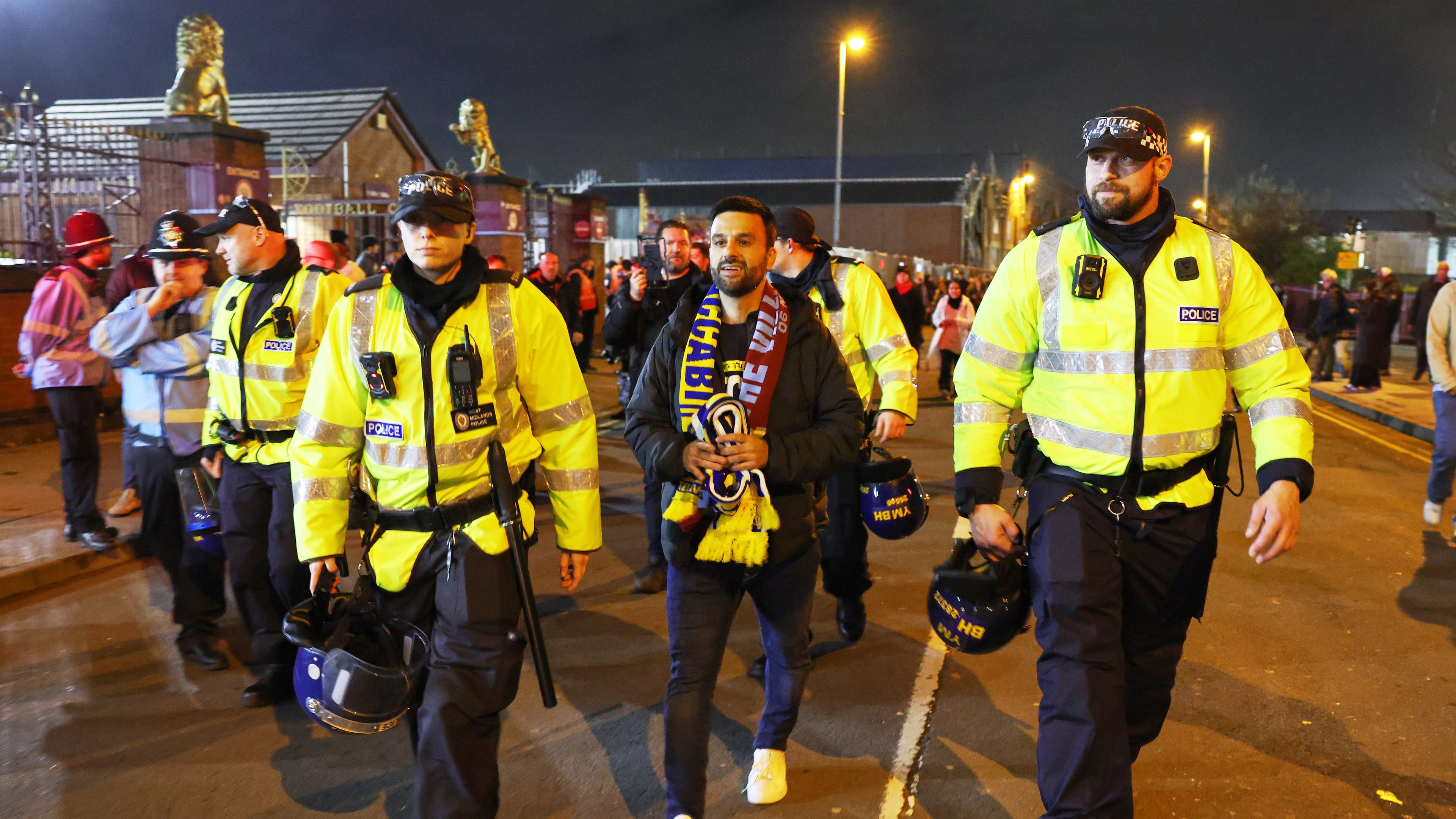 FILE - Maccabi Tel Aviv's fan is escorted by police ahead of the Europa League soccer match between Aston Villa and Maccabi Tel Aviv in Birmingham, England, Thursday, Nov. 6, 2025. (AP Photo/Darren Staples, file)