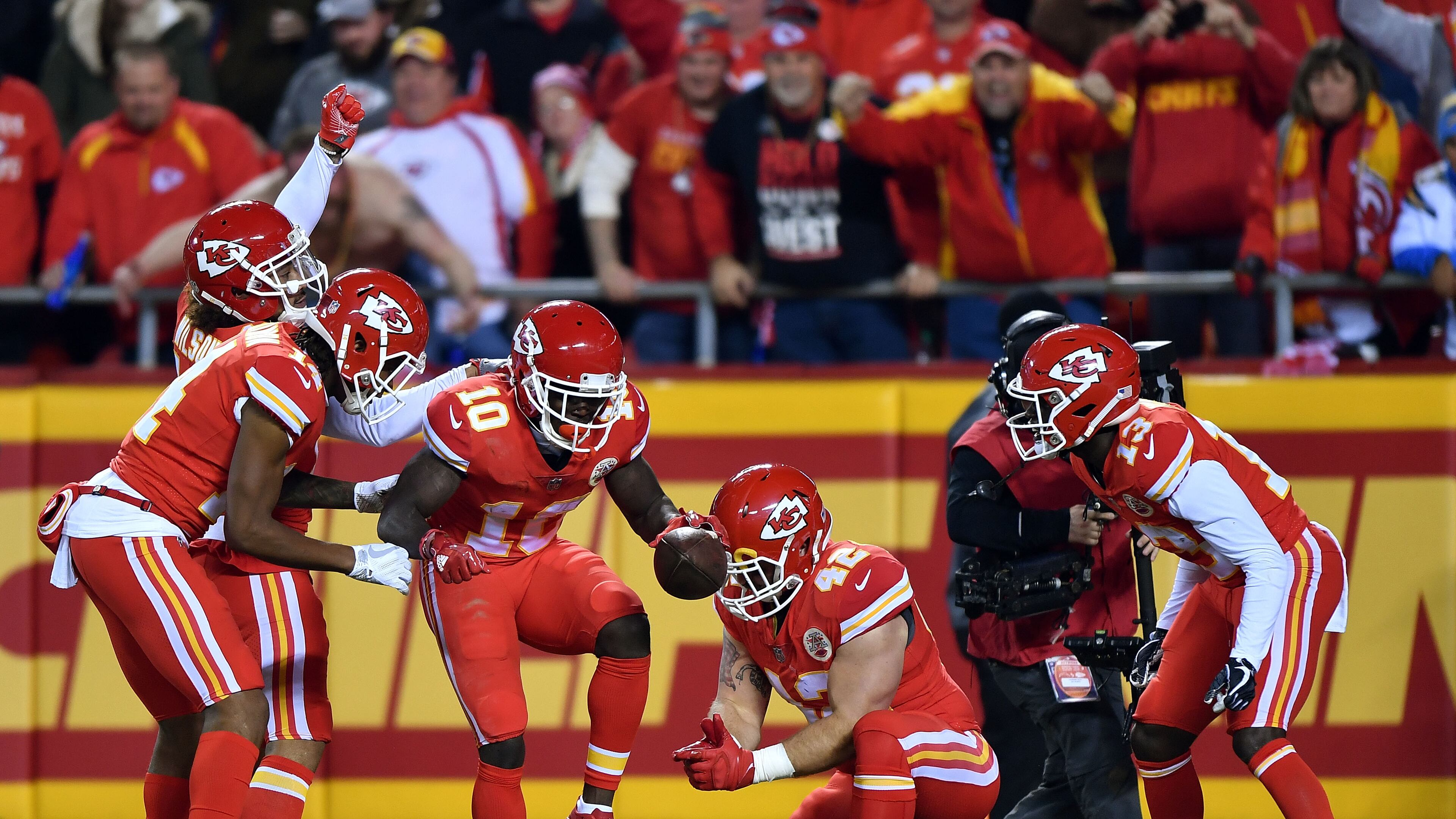 The Kansas City Chiefs break into an endzone act after a touchdown earlier this season. (Peter Aiken/Getty Images)