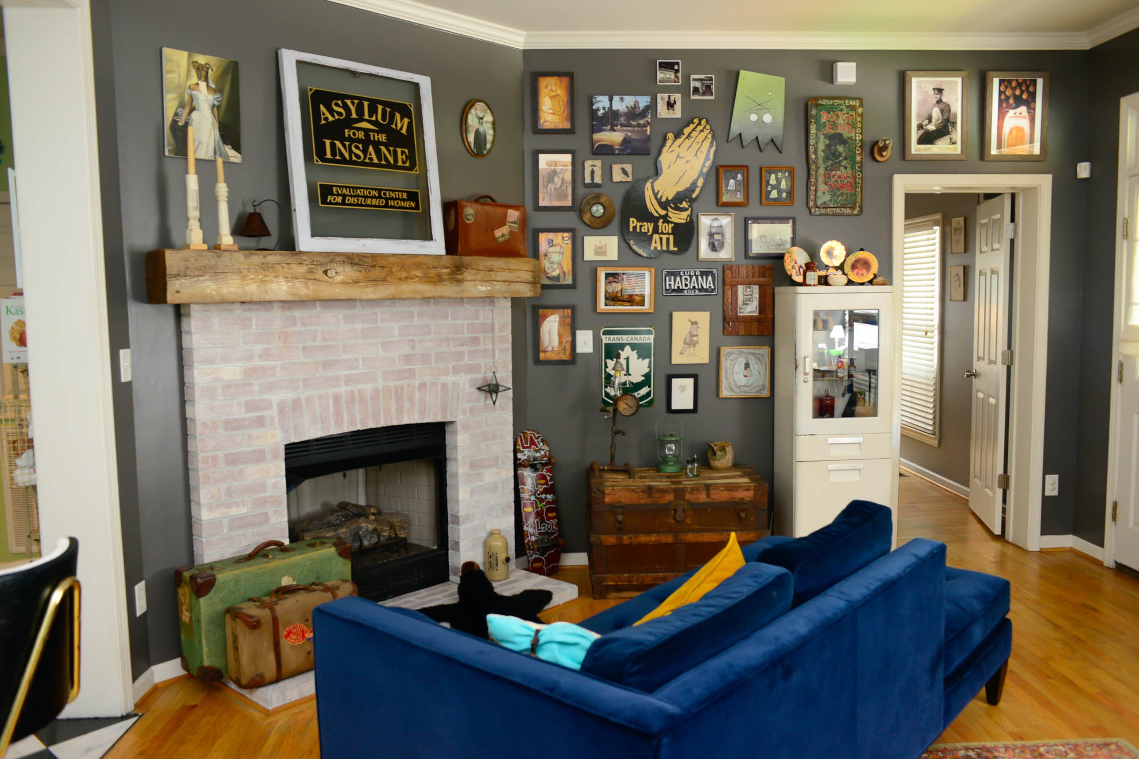 The 2003 bungalow they bought in 2016 didn't need much renovating. One of their few updates was whitewashing the brick fireplace and installing a new mantel made from an old barn beam.