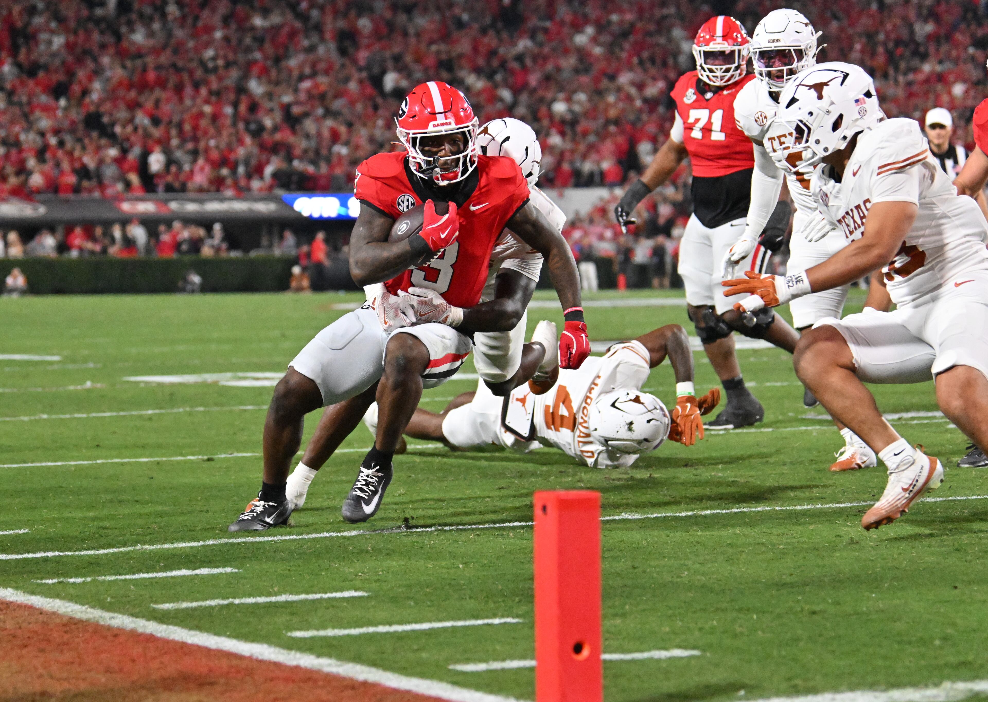 Georgia wide receiver Zachariah Branch (1) runs the ball during the first half in an NCAA football game at Sanford Stadium, Saturday, November 15, 2025, in Athens. (Hyosub Shin / AJC)