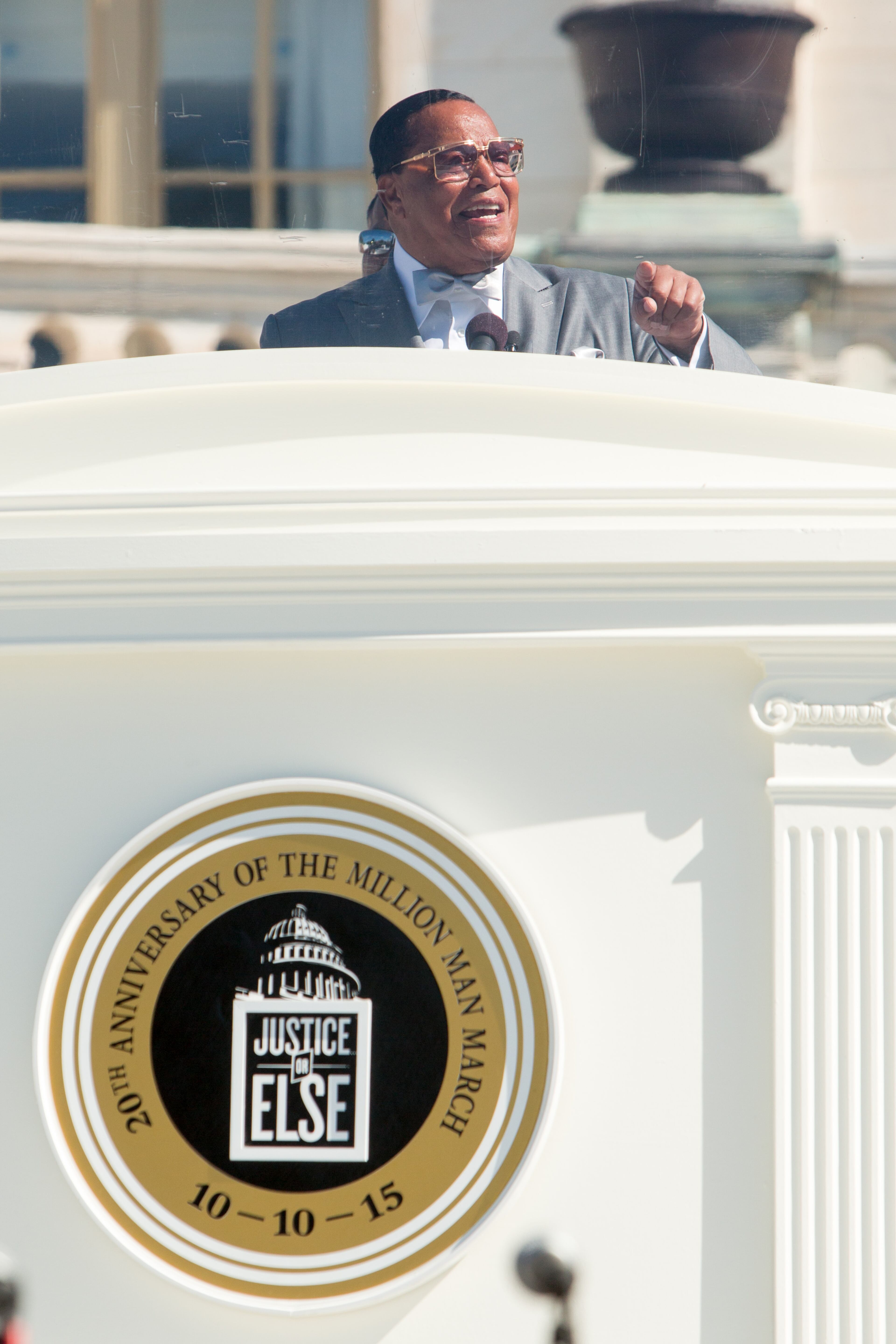 WASHINGTON, DC - OCTOBER 10, 2105: Minister Louis Farrakhan speaks from behind a bullet-proof shield on the West Front of the U.S. Capitol building for "Justice or Else," a rally held to commemorate the 20th anniversary of the Million Man March on October 10, 2015 in Washington, D.C. (Photo by Allison Shelley/Getty Images)