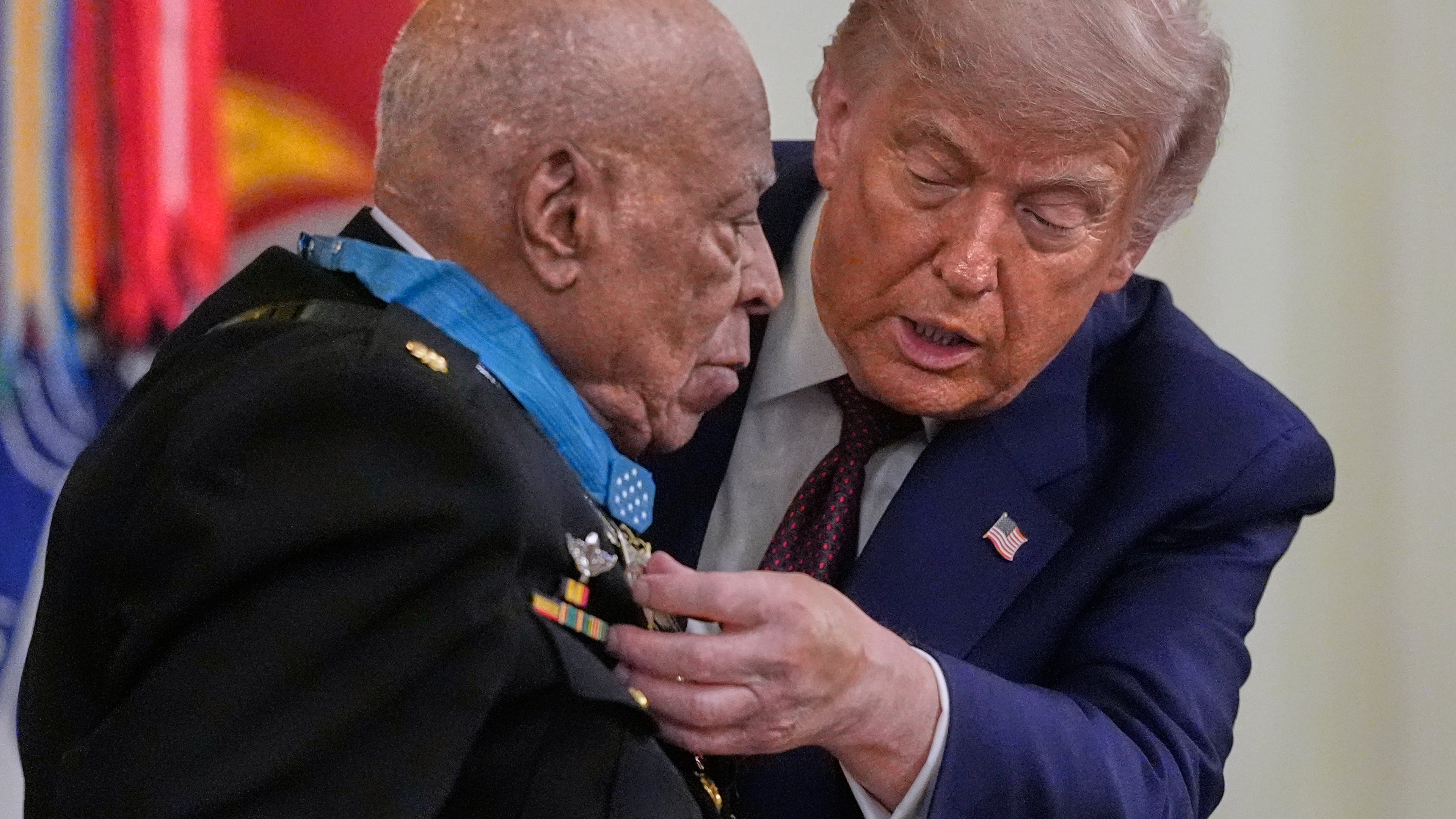 President Donald Trump presents the Medal of Honor to retired U.S. Marine Corps Maj. James Capers, Jr., during an East Room ceremony at the White House in Washington, Thursday, June 18, 2026 in Washington. (AP Photo/Manuel Balce Ceneta)
