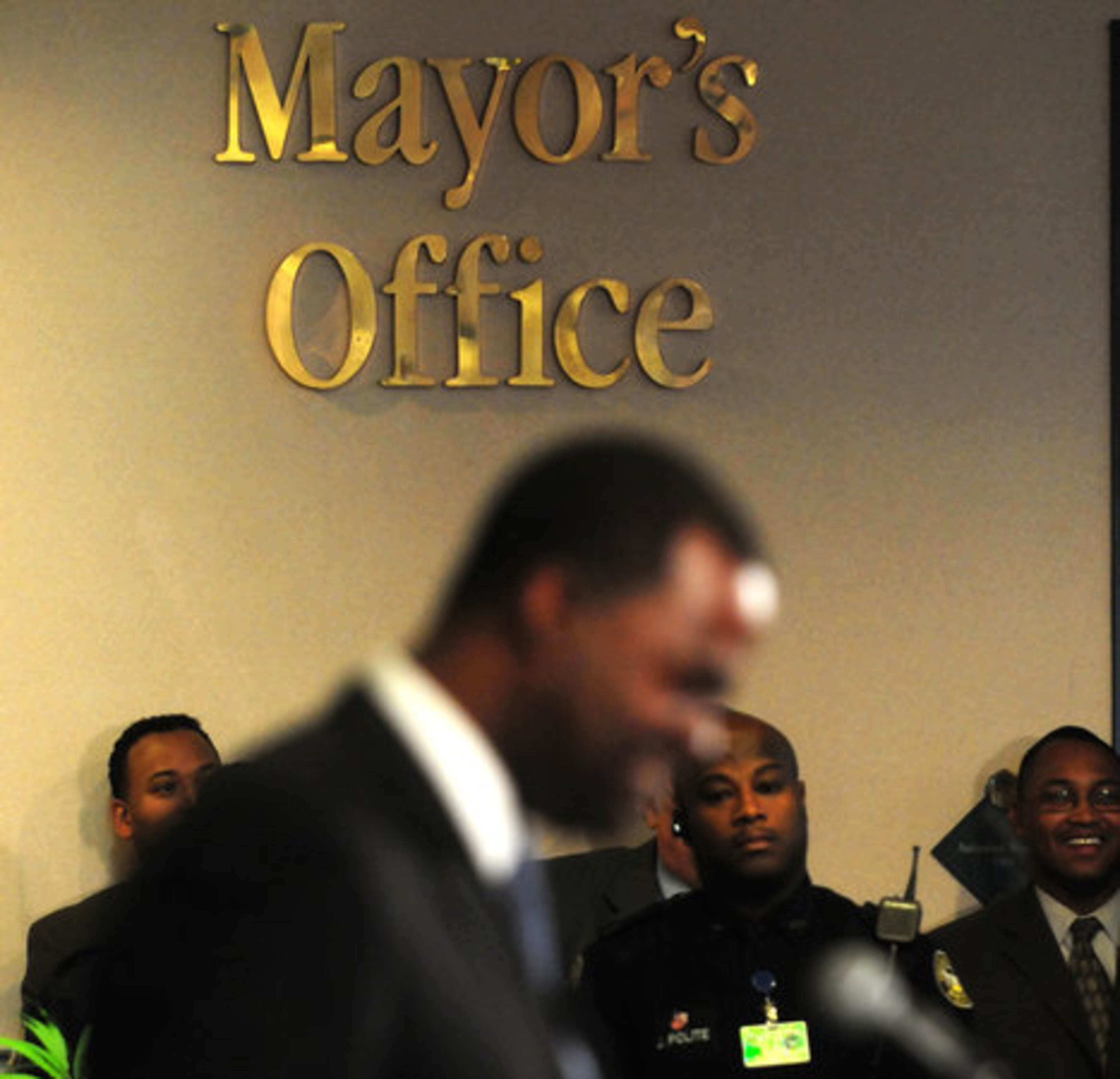 Atlanta Mayor Kasim Reed speaks from the podium during a press conference outside of his new City Hall office on his first full day as Mayor.