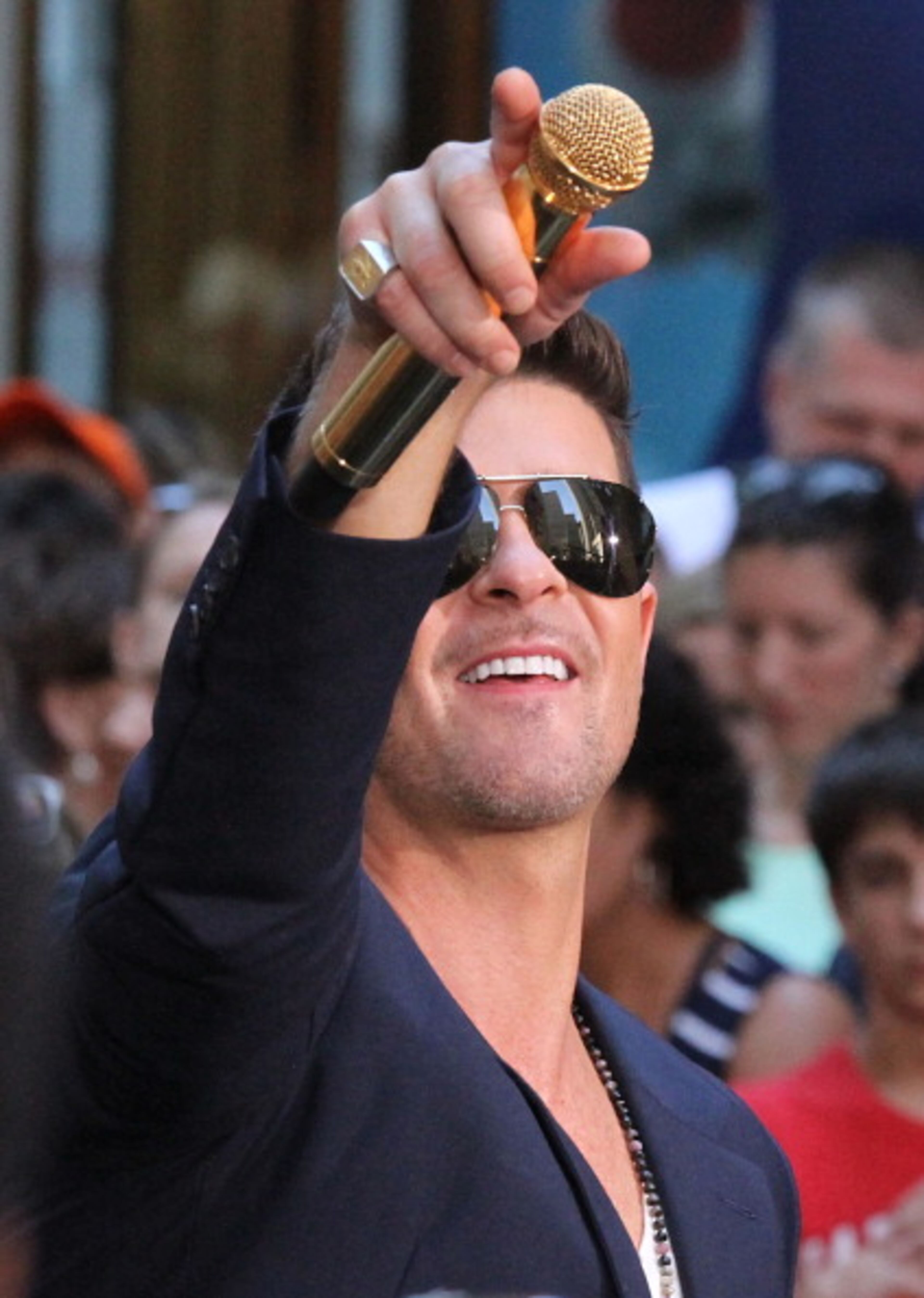 NEW YORK, NY - JULY 30: Robin Thicke performs at NBC's TODAY Show on July 30, 2013 in New York City. (Photo by Rob Kim/Getty Images)