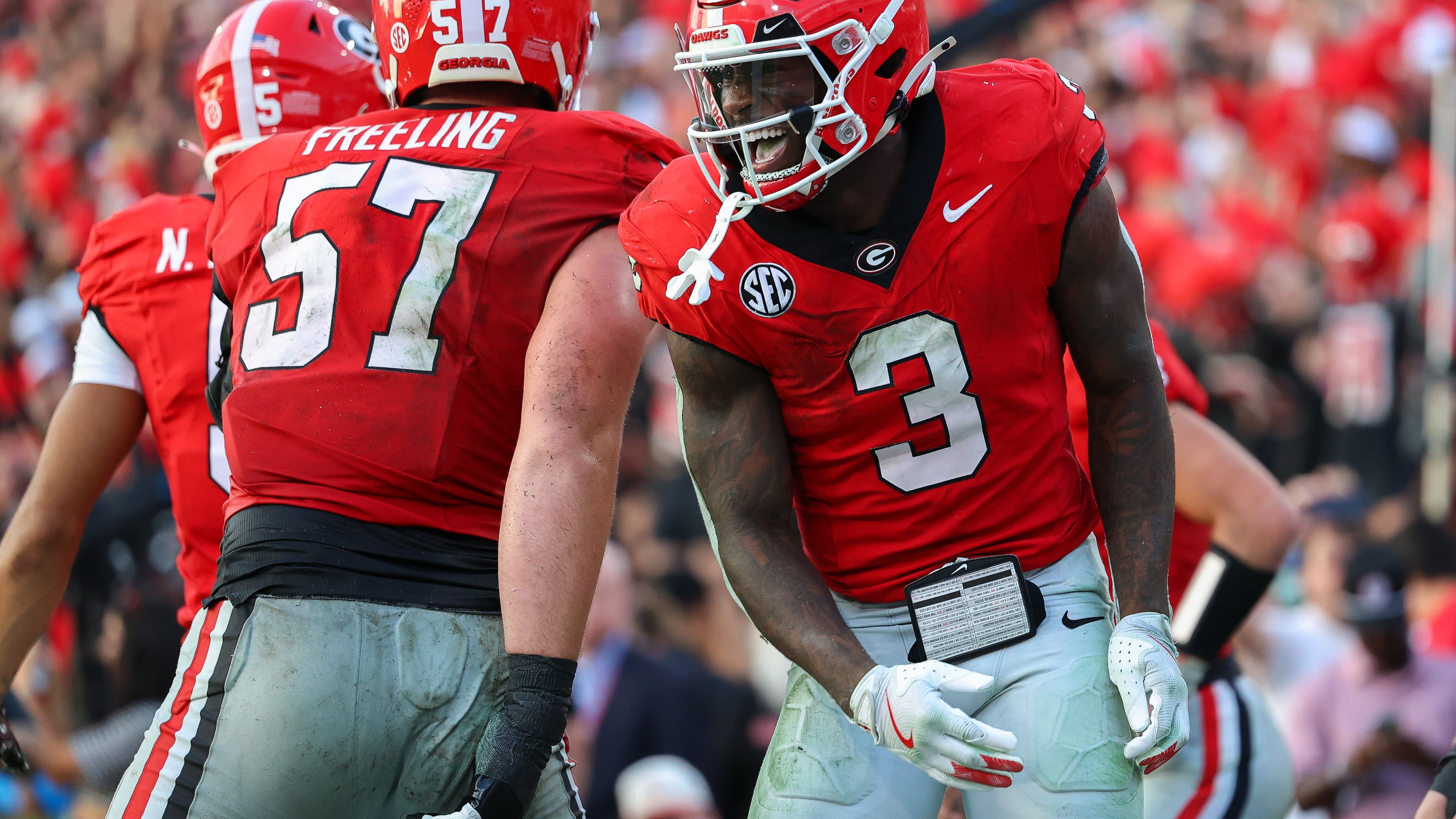 FILE - Georgia running back Nate Frazier (3) reacts after scoring a touchdown during the second half of an NCAA college football game against Mississippi, Oct. 18, 2025, in Athens, Ga. (AP Photo/Colin Hubbard, File)