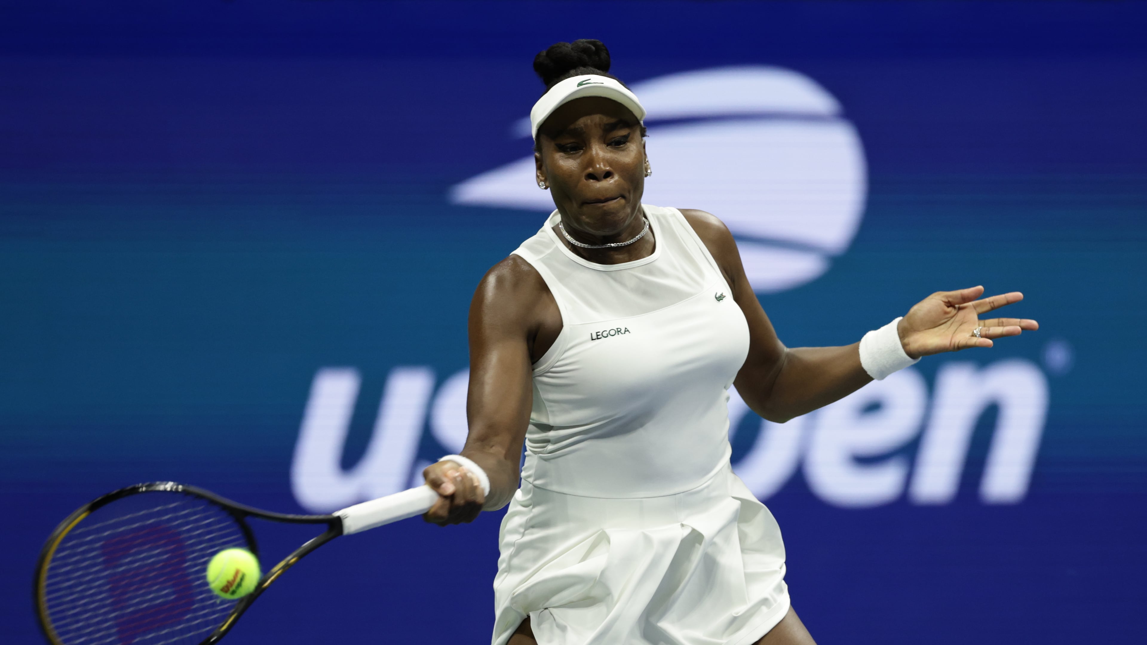 FILE - Venus Williams, of the United States, hits a return as she plays a women's doubles match with partner Serena Williams against Hao-Ching Chan, of Taiwan, and Maya Joint, at the U.S. Open tennis championships, Friday, Sept. 4, 2026, in New York. (AP Photo/Adam Hunger, File)
