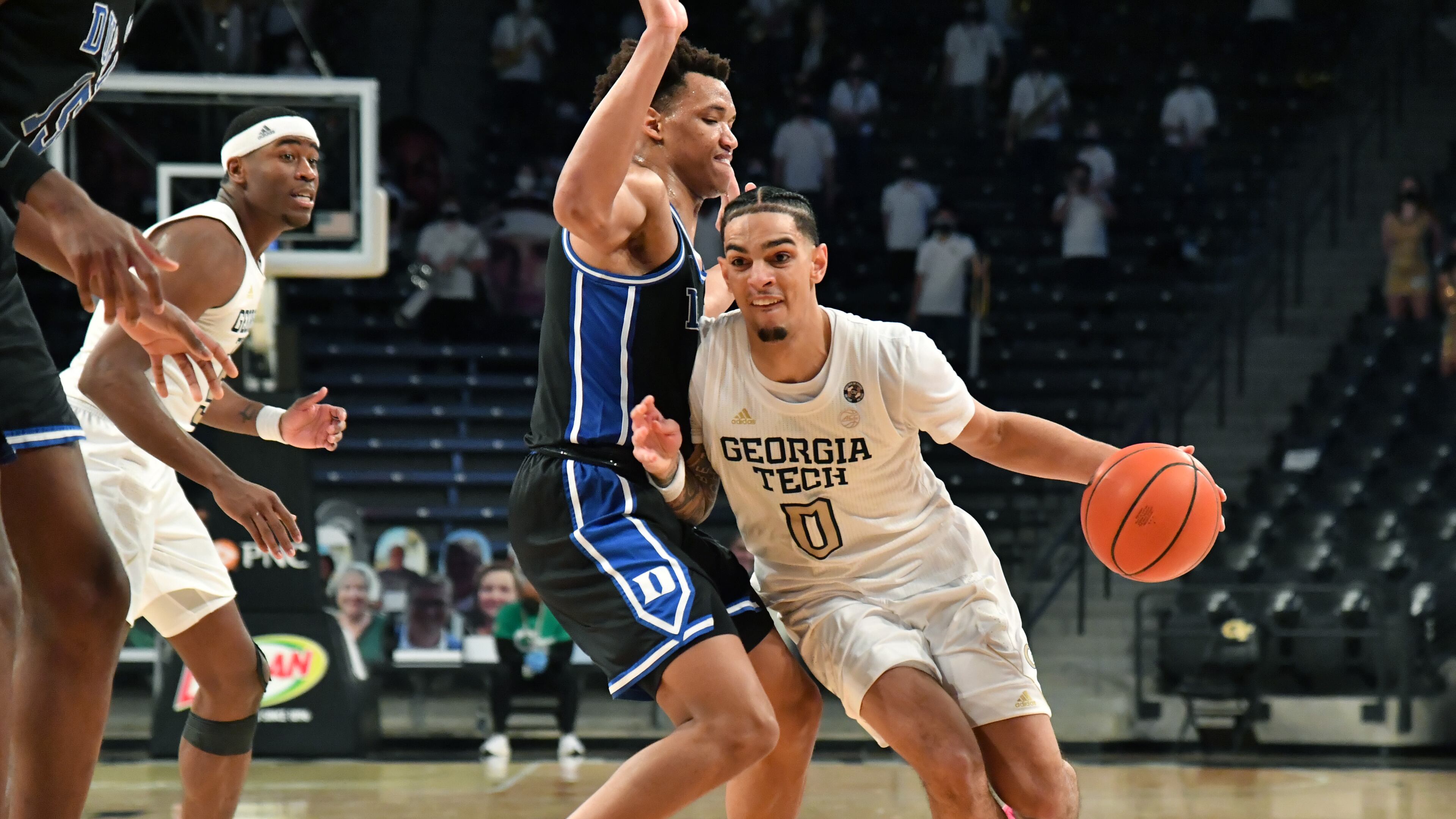 Georgia Tech guard Michael Devoe (0) drives against Duke forward Wendell Moore Jr. (0) in the second half Tuesday, March 2, 2021, at McCamish Pavilion in Atlanta. Georgia Tech won 81-77 in overtime. (Hyosub Shin / Hyosub.Shin@ajc.com)