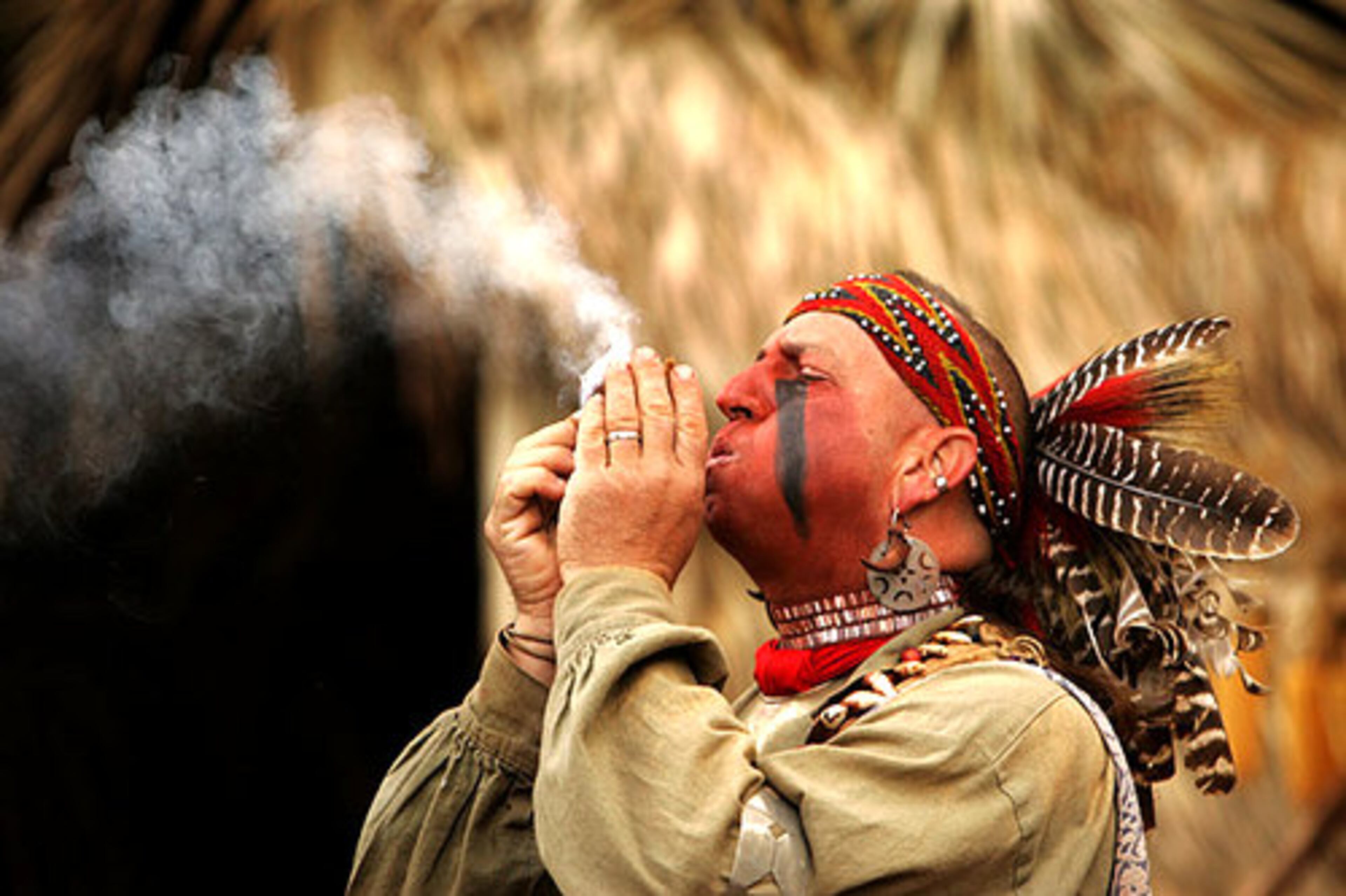 Jim Sawgrass dressed in Creek attire demonstrates how to start a fire at the 8th Annual Stone Mountain Park Indian Festival and Pow-Wow.
