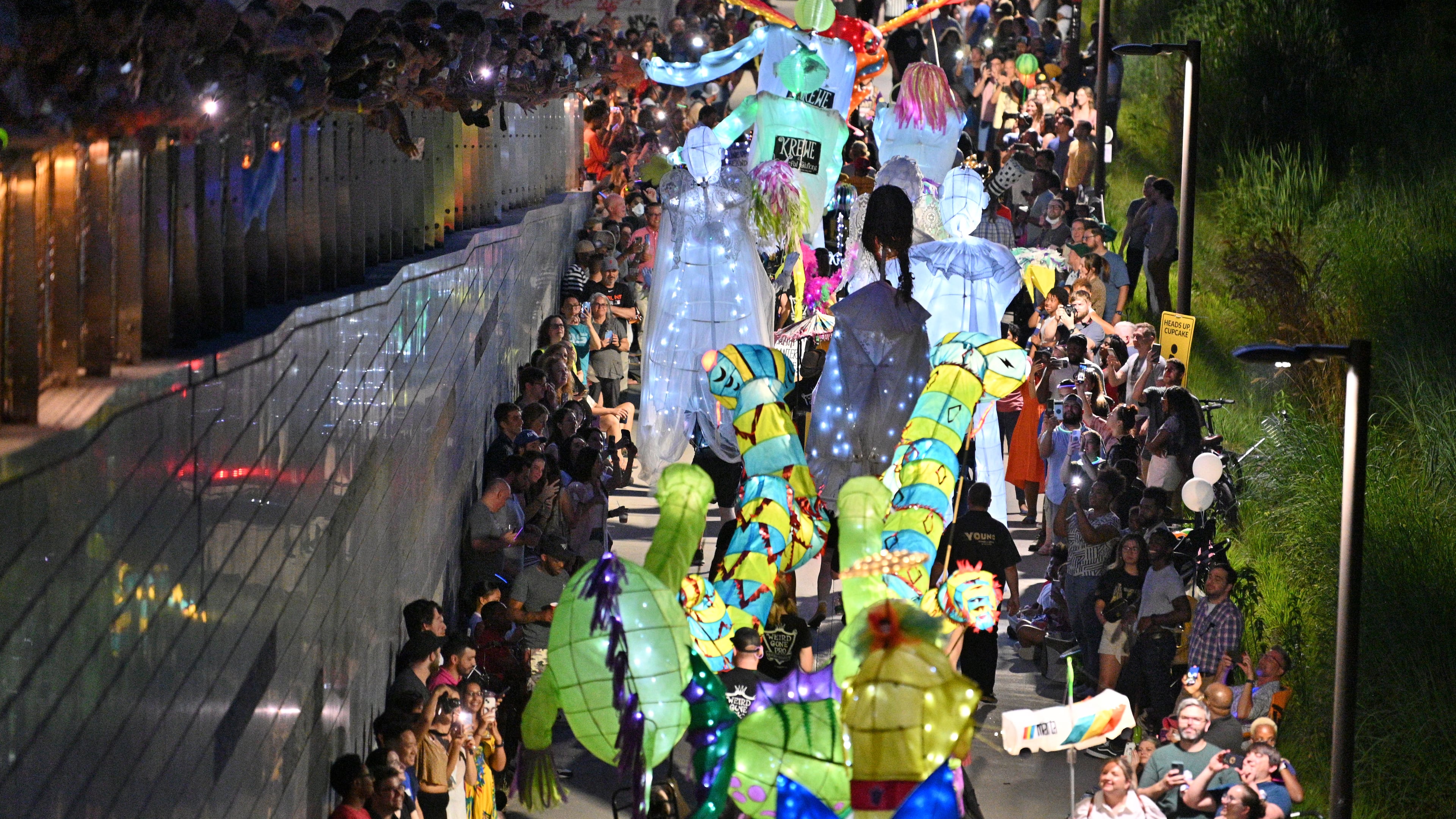 May 21, 2022 Atlanta - Hundreds of parade participants float on the Atlanta Beltline Westside Trail during the 12th Atlanta Beltline Lantern Parade on Saturday, May 21, 2022. (Hyosub Shin / Hyosub.Shin@ajc.com)