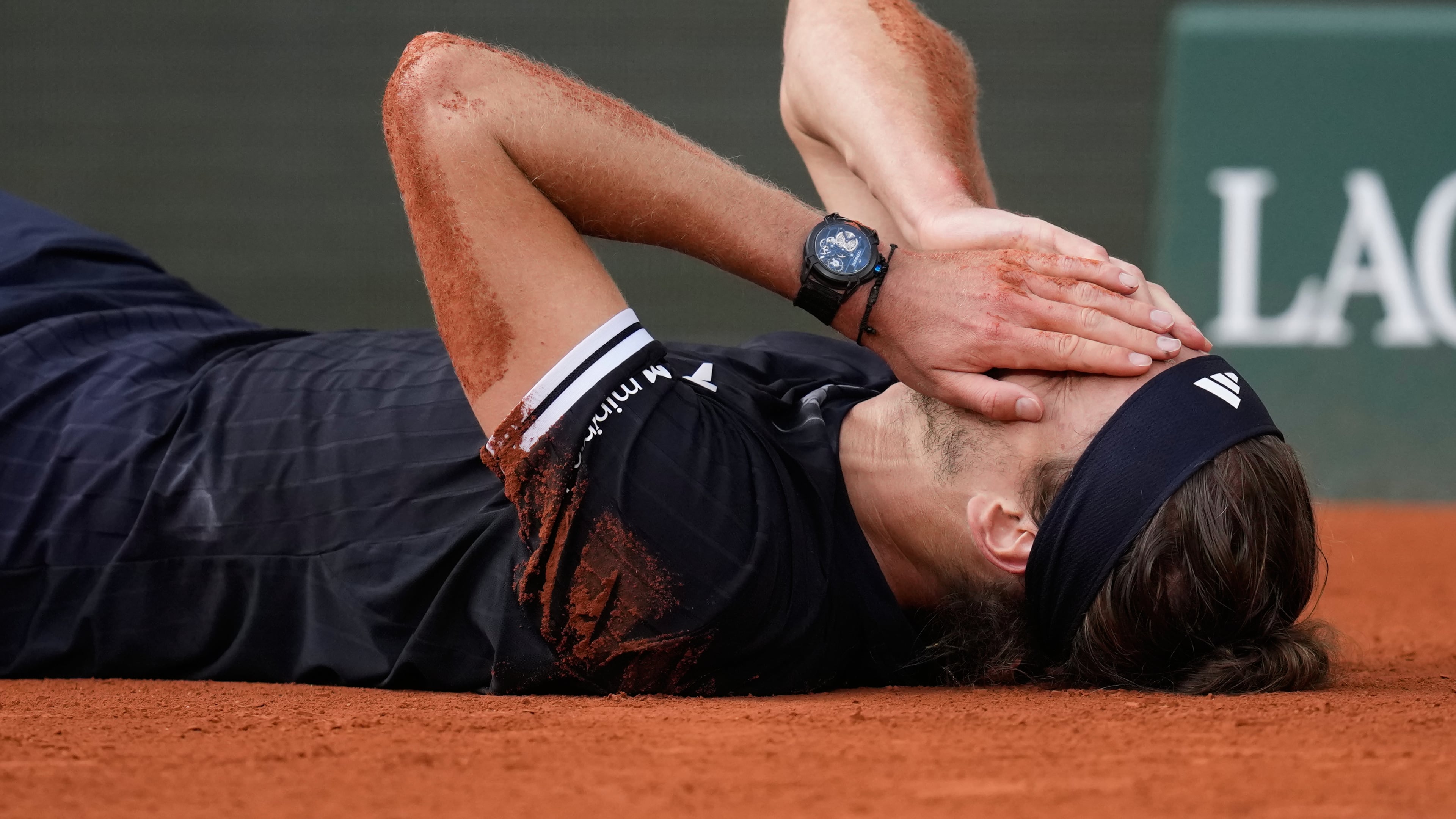 Alexander Zverev of Germany celebrates after winning the men's final match against Flavio Cobolli of Italy at the French Open tennis tournament in Paris, Sunday, June 7, 2026. (AP Photo/Christophe Ena)