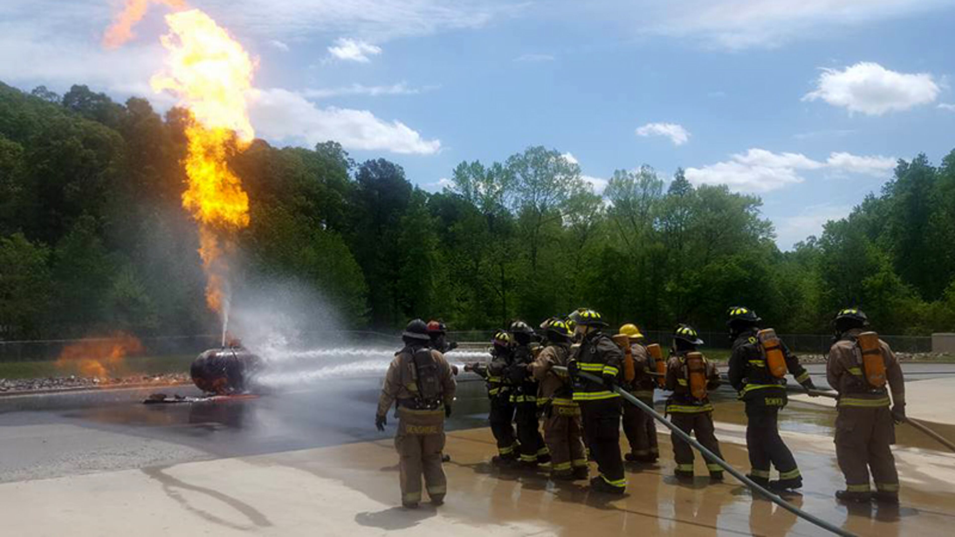 Firefighters conduct live fire training at the Cherokee County Fire & Emergency Services training facility in Holly Springs. CHEROKEE COUNTY FIRE TRAINING COMPLEX via Facebook