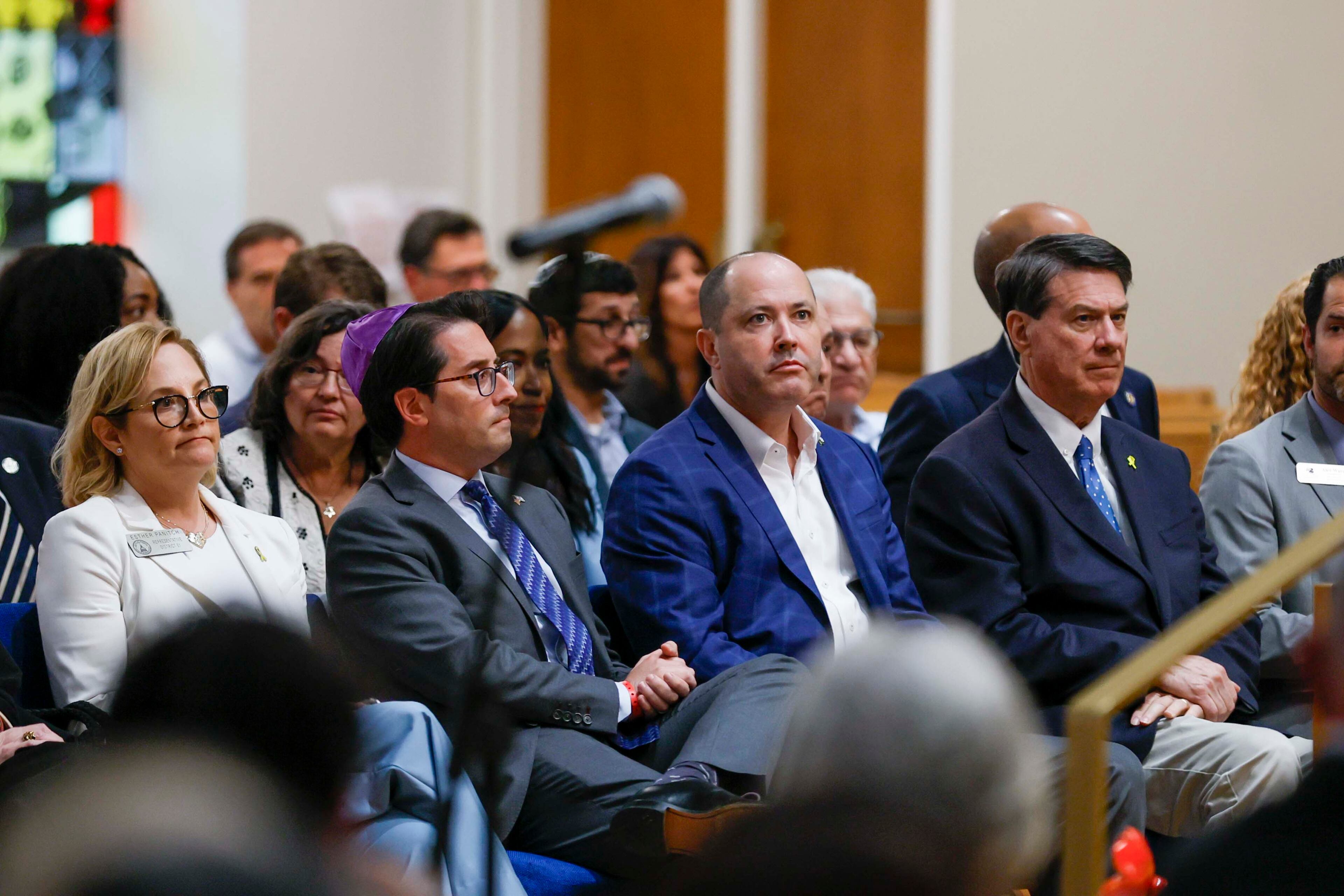 Elected officials, including Georgia Attorney General Chris Carr (center) were recognized at the Ahavath Achim Synagogue as members of the Jewish community gathered on Sunday, Oct. 5, 2025, to mark the second anniversary of the Oct. 7 attacks. (Miguel Martinez/AJC)
