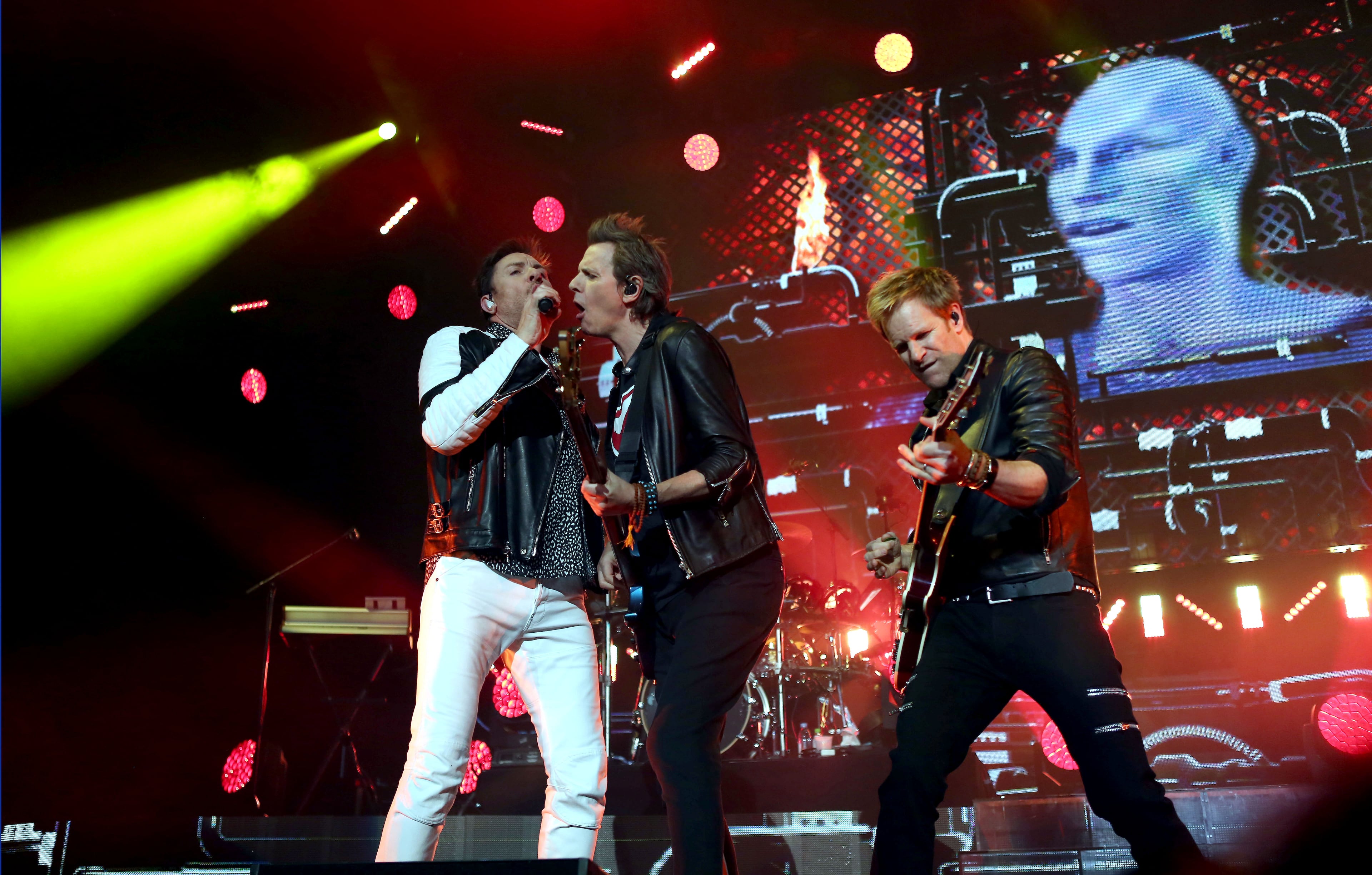 British rockers Duran Duran with lead singer Simon Le Bon, bassist John Taylor and guitarist Dom Brown. (Akili-Casundria Ramsess/Special to the AJC)