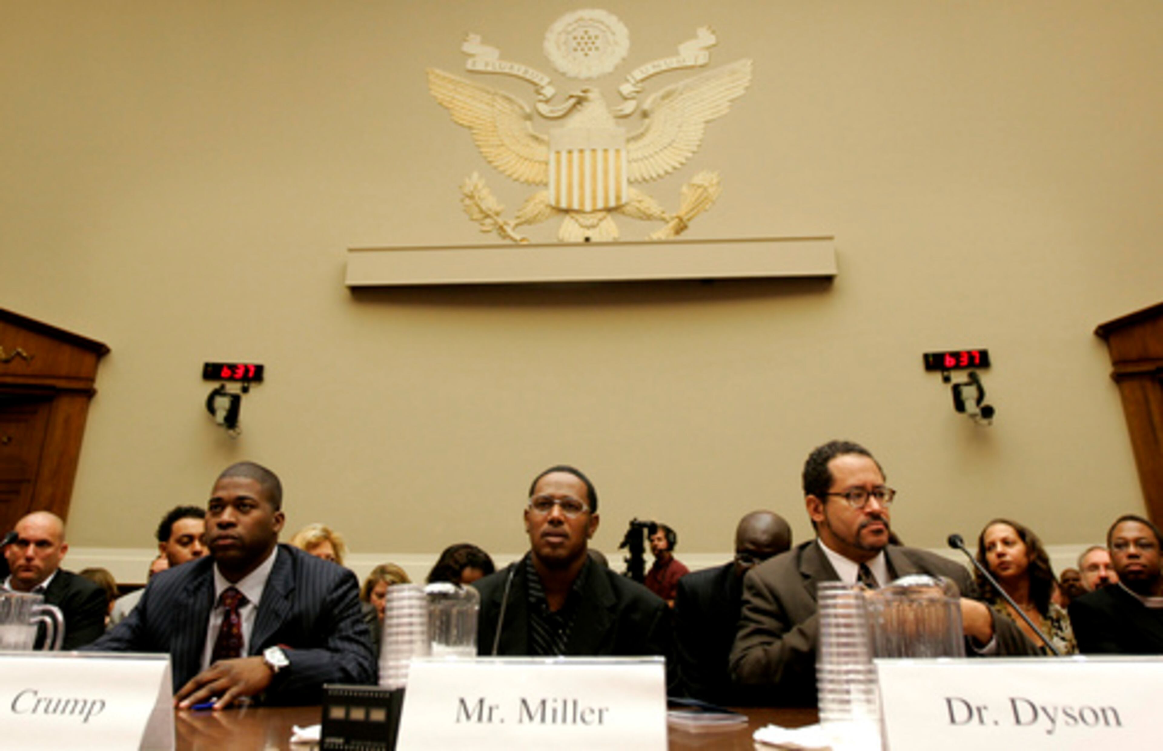 Levell Crump a.k.a. "David Banner" (from left), Percy Miller a.k.a. "Master P" and Georgetown University Professor Michael Eric Dyson listen during opening remarks at the House Commerce, Trade and Consumer Protection Subcommittee hearing on stereotypes and degrading images on Capitol Hill in Washington.