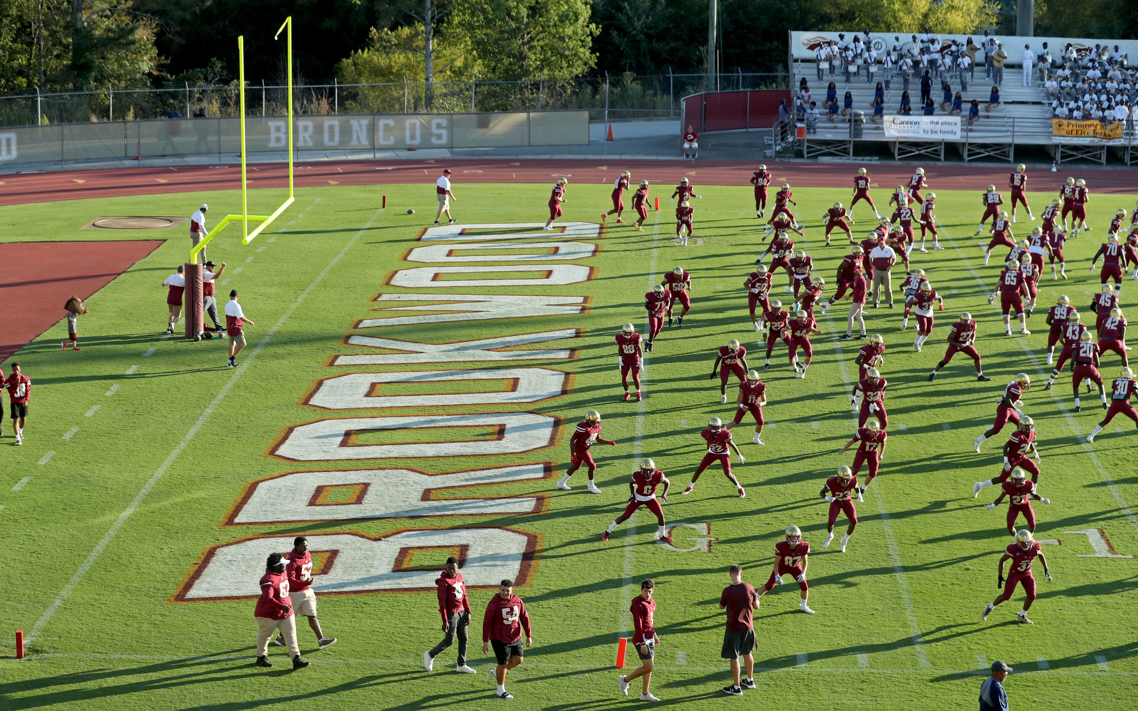 Friday Night football: Brookwood players warmup before their home game against South Gwinnett. (Jason Getz/Special)