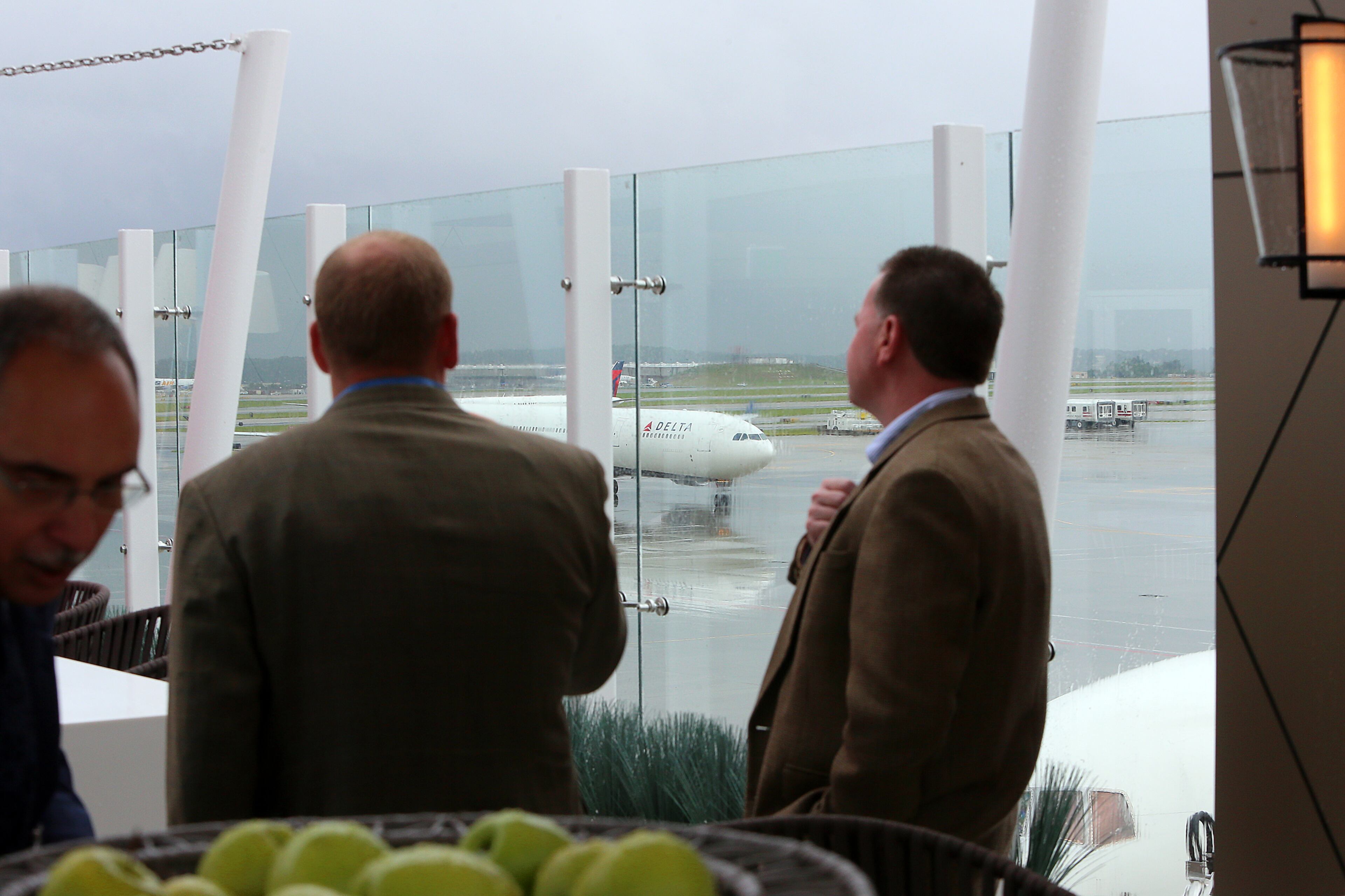 Attendees take in the view from the Sky Deck.
