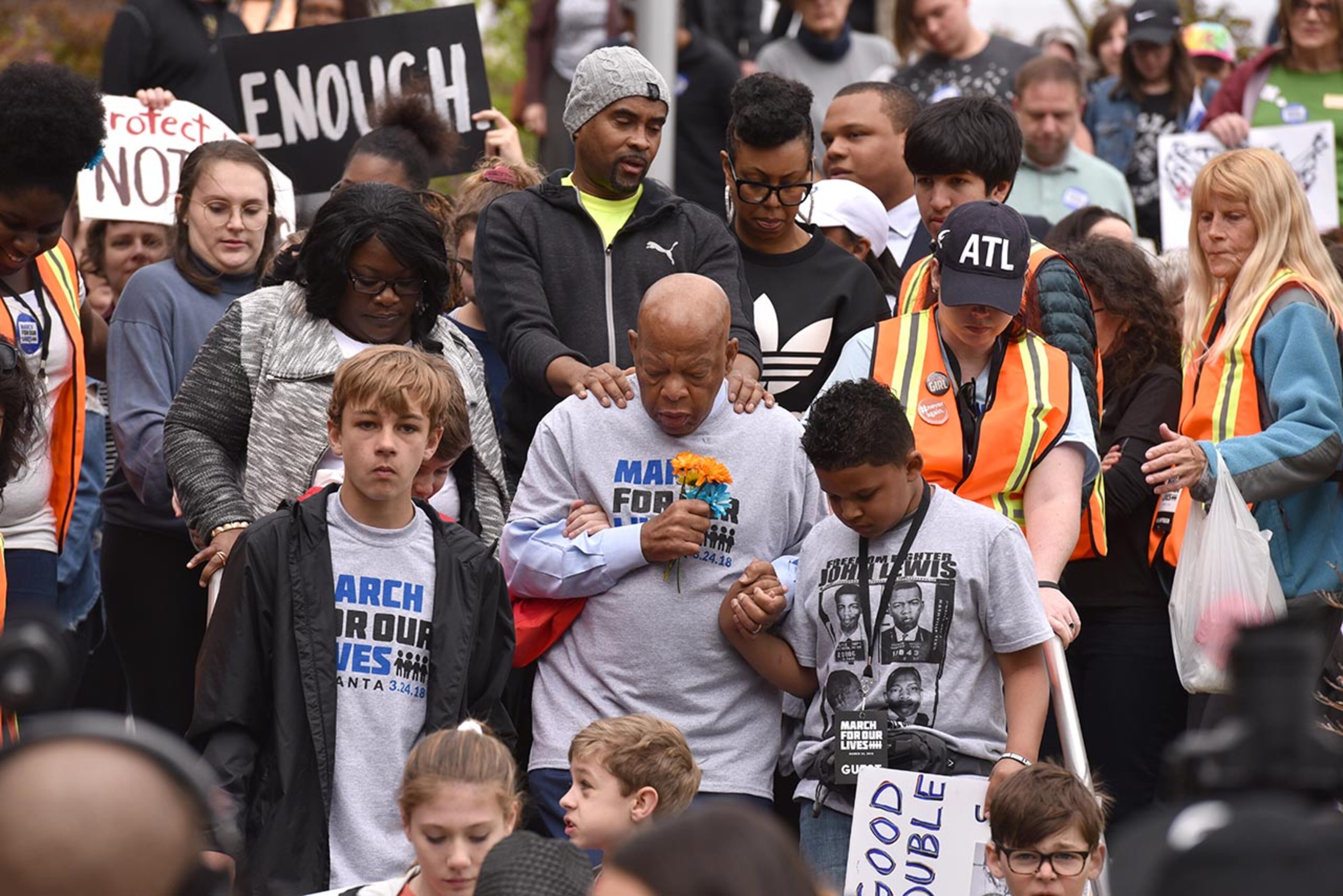 March 24, 2018 Atlanta - U.S. Rep. John Lewis and other young leaders participate in the March For Our Lives rally on Saturday, March 24, 2018. Atlanta police estimated the crowd at near 30,000 for todayâÃôs March for Our Lives. People of all ages were drawn to one of the nationwide demonstrations in a movement begun by student survivors of last monthâÃôs mass killing in a Parkland, Fla., school. Some of those Florida students were among the speakers in Atlanta. HYOSUB SHIN / HSHIN@AJC.COM