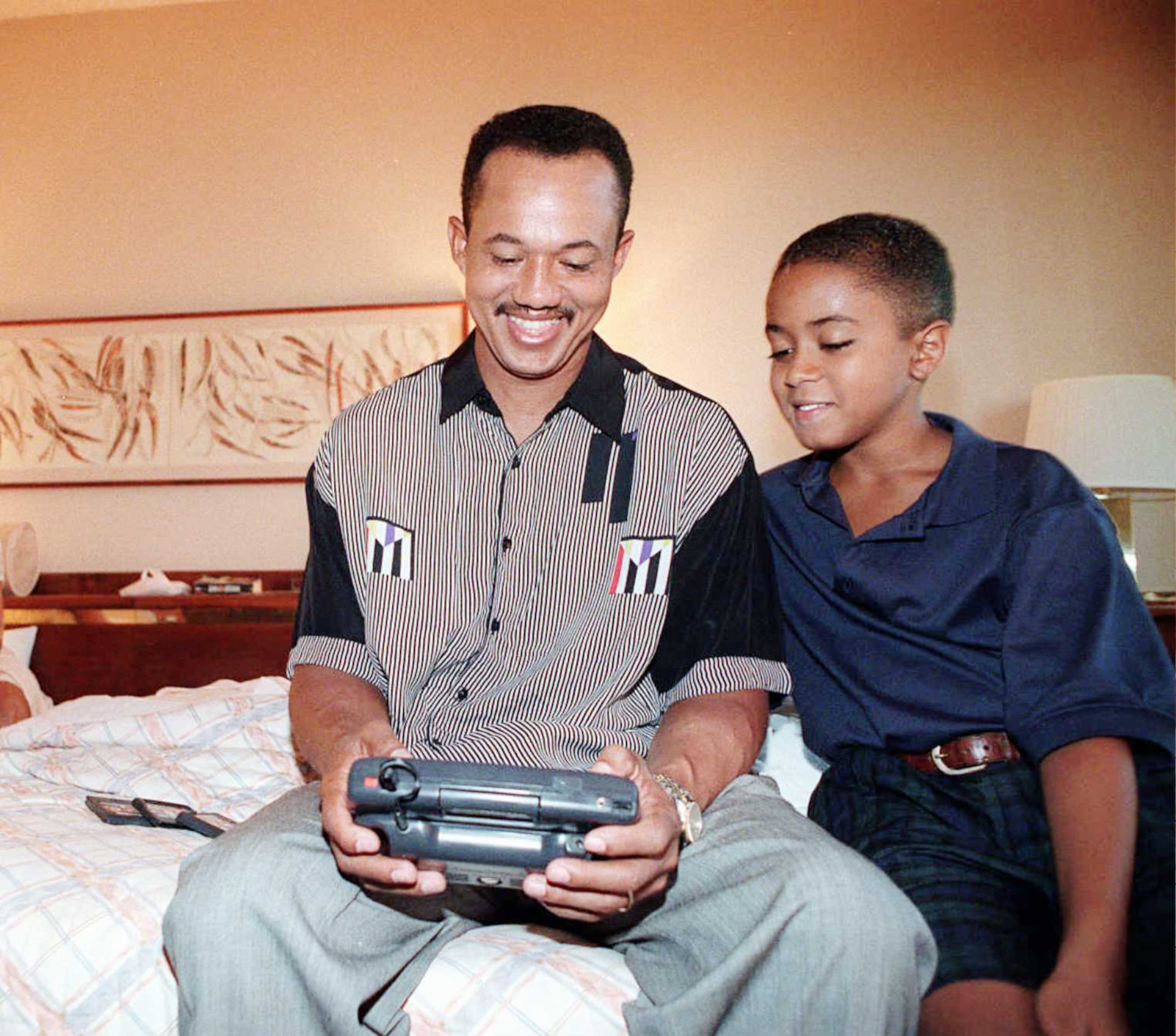 Rafael Belliard with his son Kevin in 1995. (File photo)