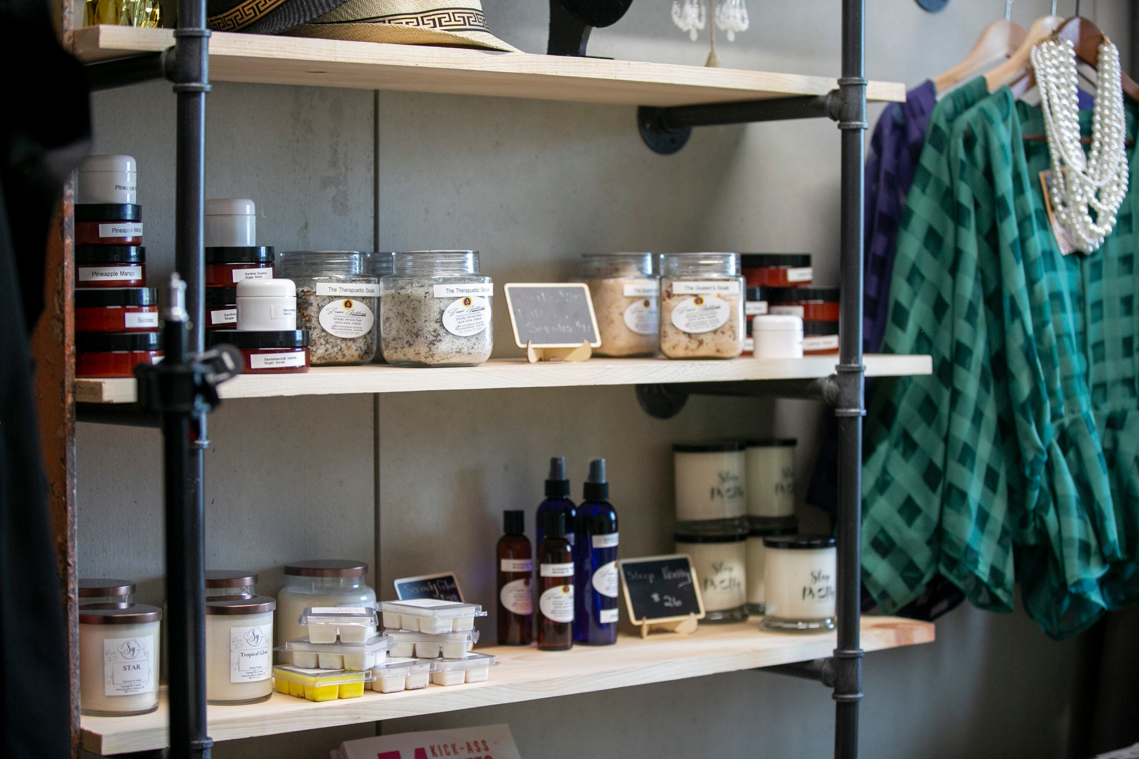 Frugal Chics Roc collaboration products are seen at their space in the Nia Building at Pittsburgh Yards, a professional and maker space near Adair Park, Capitol Gateway, Mechanicsville, Peoplestown, Pittsburgh and Summerhill neighborhoods in southwest Atlanta on Tuesday, September 7, 2021. (Rebecca Wright for the Atlanta Journal-Constitution)