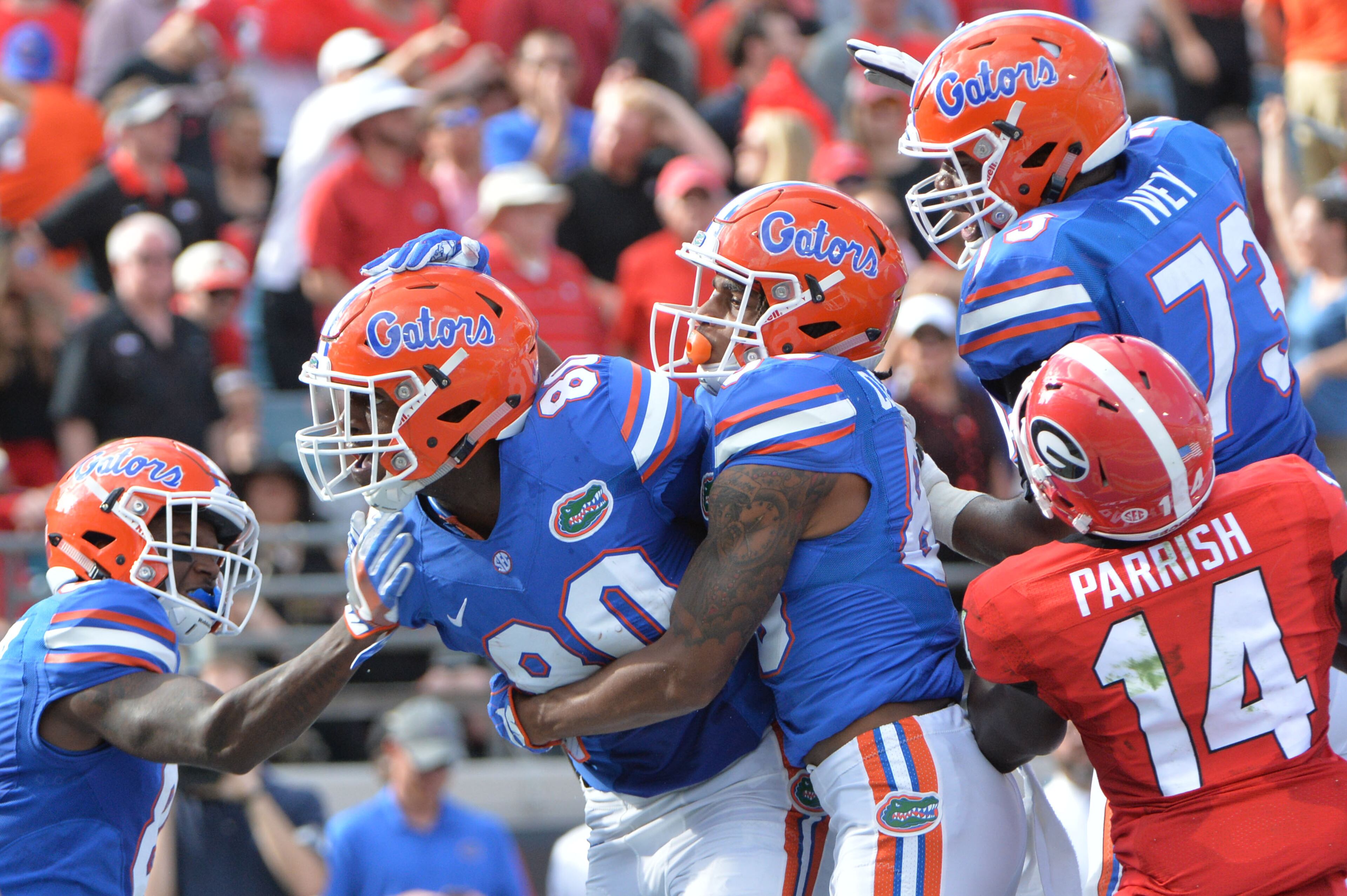 October 29, 2016 Jacksonville, Fla. - Florida tight end C'yontai Lewis (80) celebrates with teammates after he scored a touchdown in the first half of Georgia and Florida game at EverBank Field in Jacksonville, Florida on Saturday, October 29, 2016. HYOSUB SHIN / HSHIN@AJC.COM