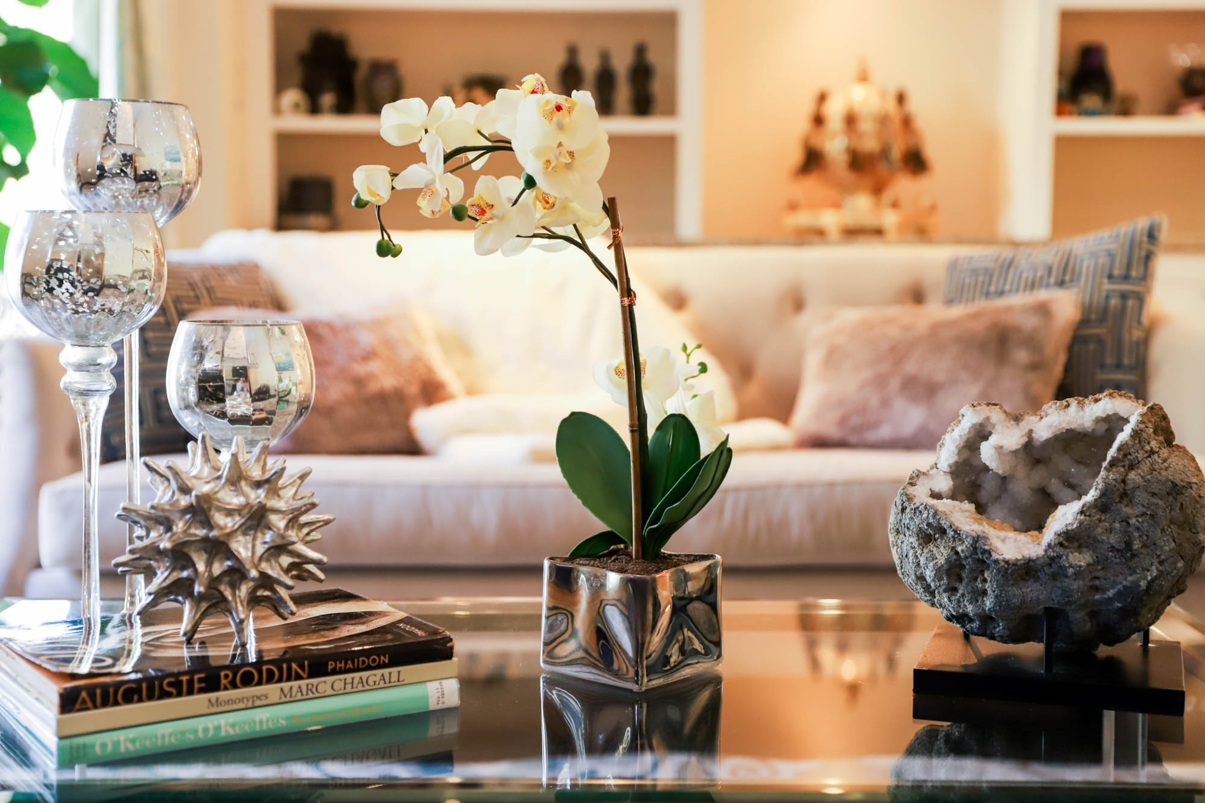 A geode resting on the glass coffee table in the living room was a gift to Sugandha Rosenhaft from her husband, Aaron.
