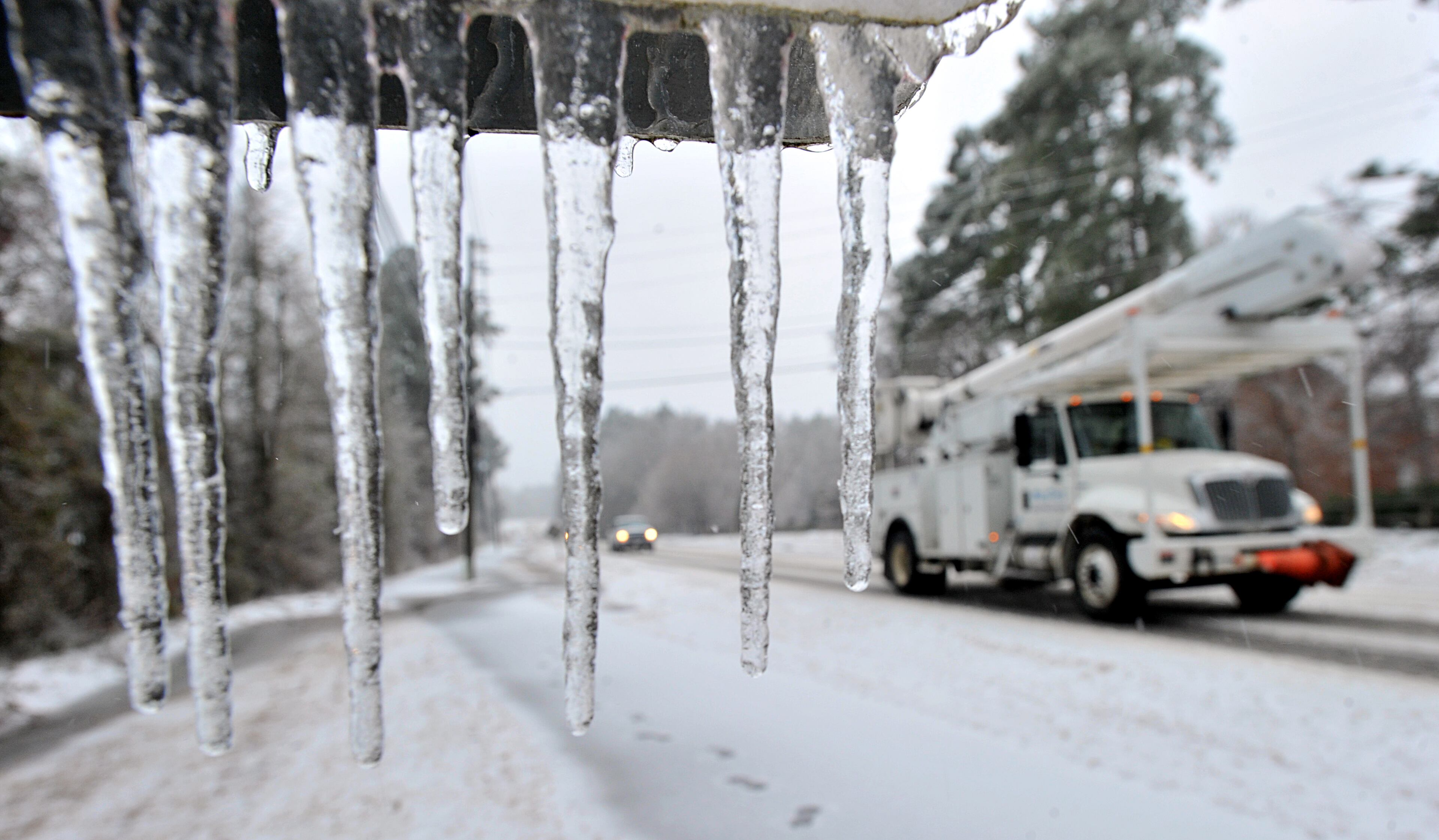 Ice clings to a sign in Martinez, suburb of Augusta on Wednesday, February 12, 2014.HYOSUB SHIN / HSHIN@AJC.COM