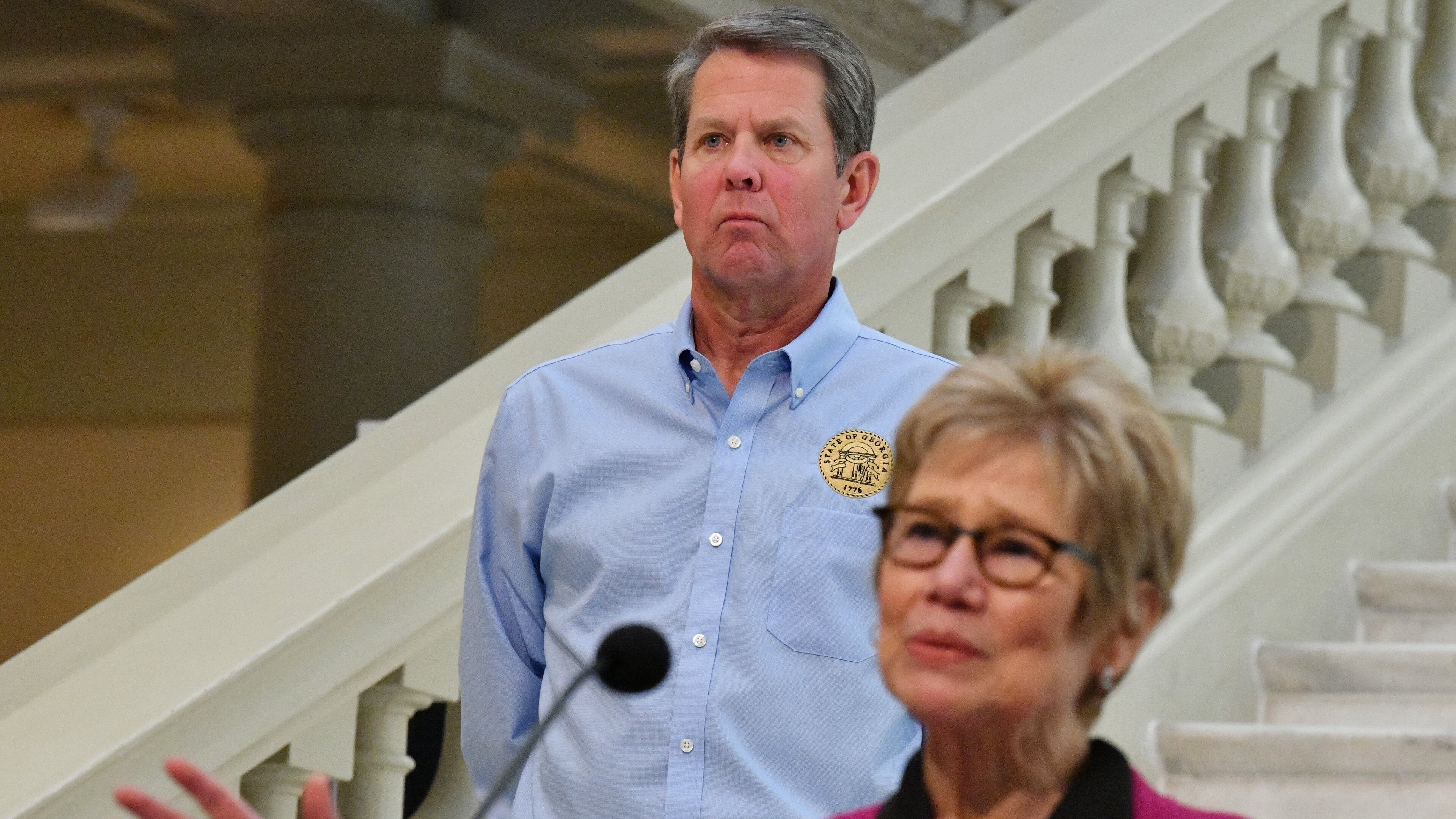 May 12, 2020 Atlanta - Dr. Kathleen Toomey, commissioner of Georgia Department of Public Health, speaks as Governor Brian Kemp looks during a press briefing to update on COVID-19 at the Georgia State Capitol on Tuesday, May 12, 2020. (Hyosub Shin / Hyosub.Shin@ajc.com)