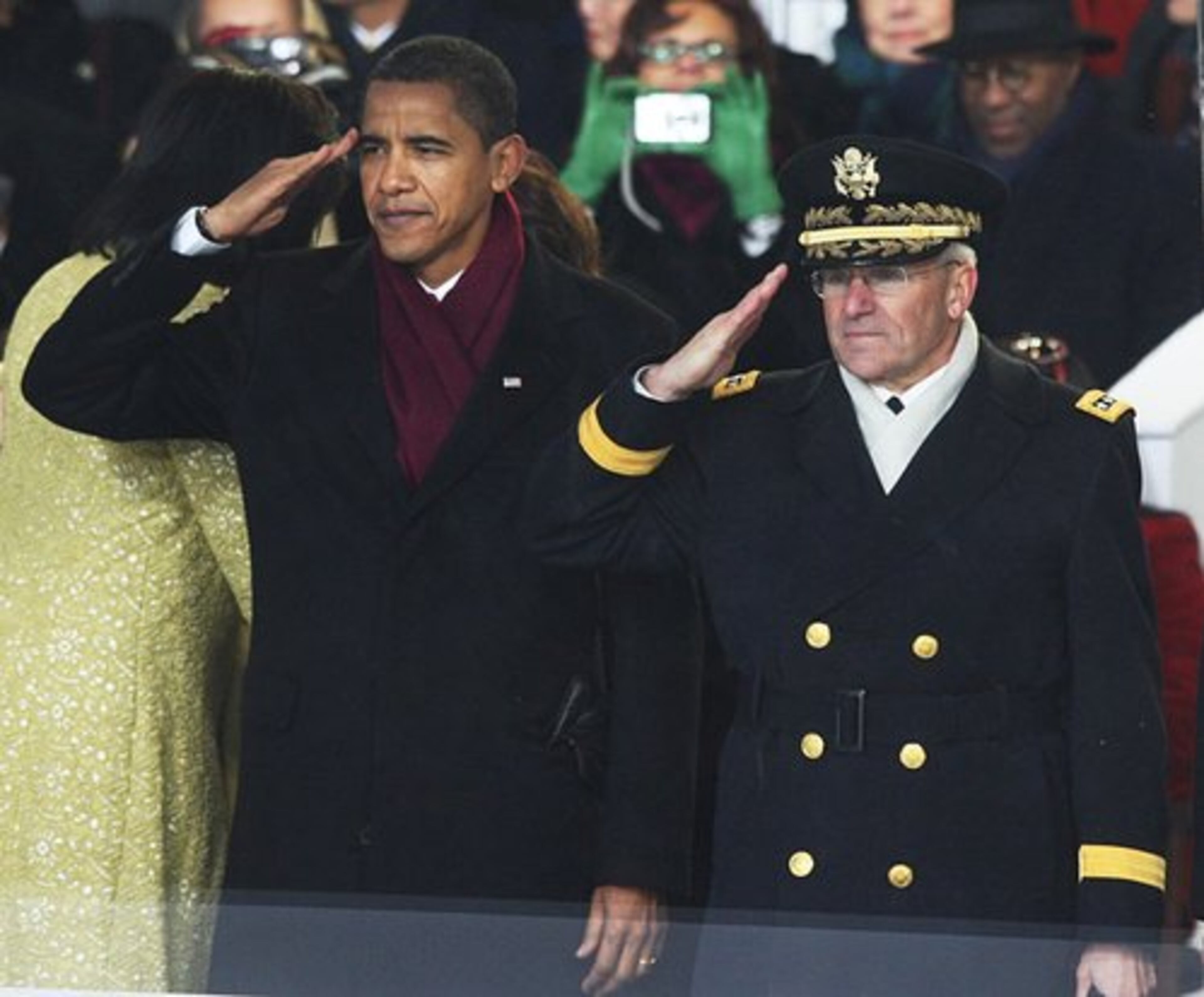 Obama and Chief of Naval Operations Adm. Gary Roughead salute during the inaugural parade.