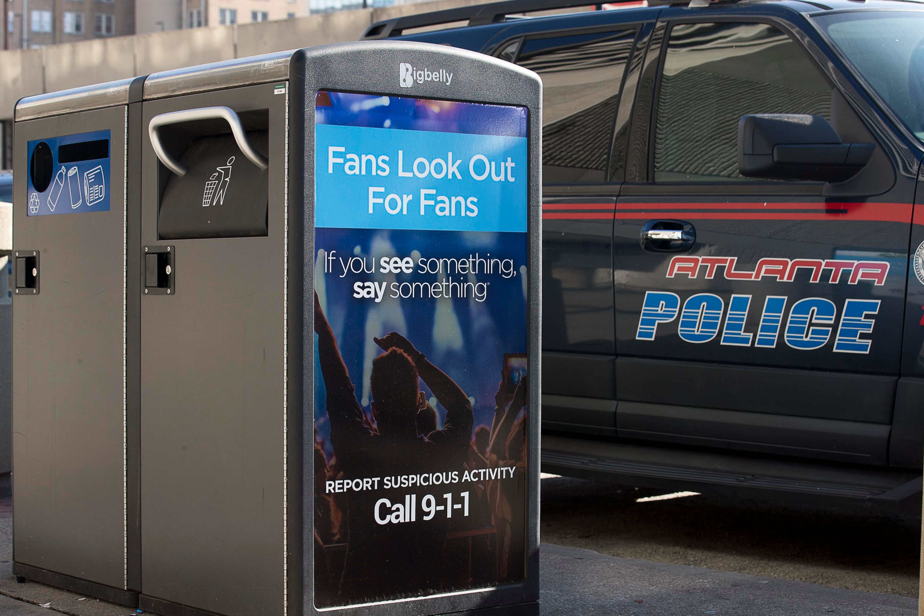 01/16/2019 -- Atlanta, Georgia -- An advertisement for public safety is wrapped around a trash receptacle along Centennial Olympic Drive NW in Atlanta, Wednesday, January 16, 2019. (ALYSSA POINTER/ALYSSA.POINTER@AJC.COM)