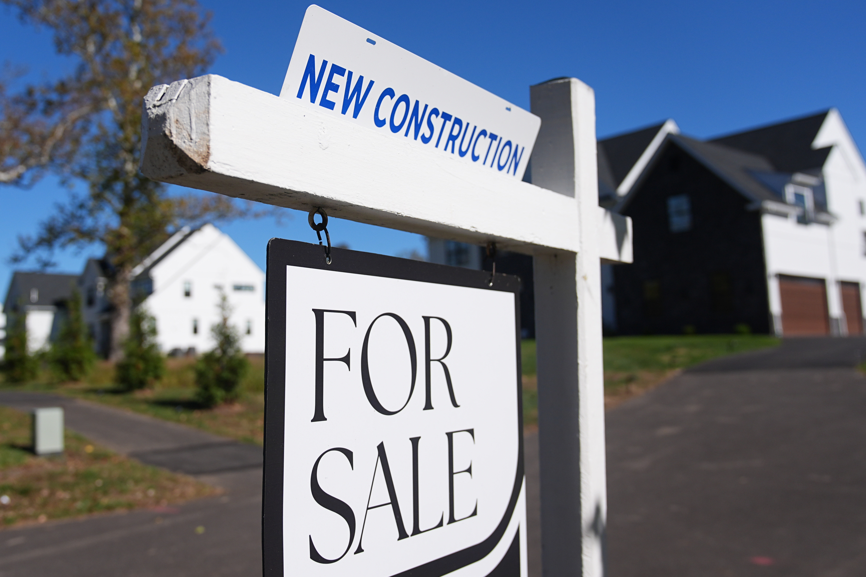 FILE - A sign is posted for a new home for sale in Ambler, Pa., Oct. 16, 2025. (AP Photo/Matt Rourke, File)