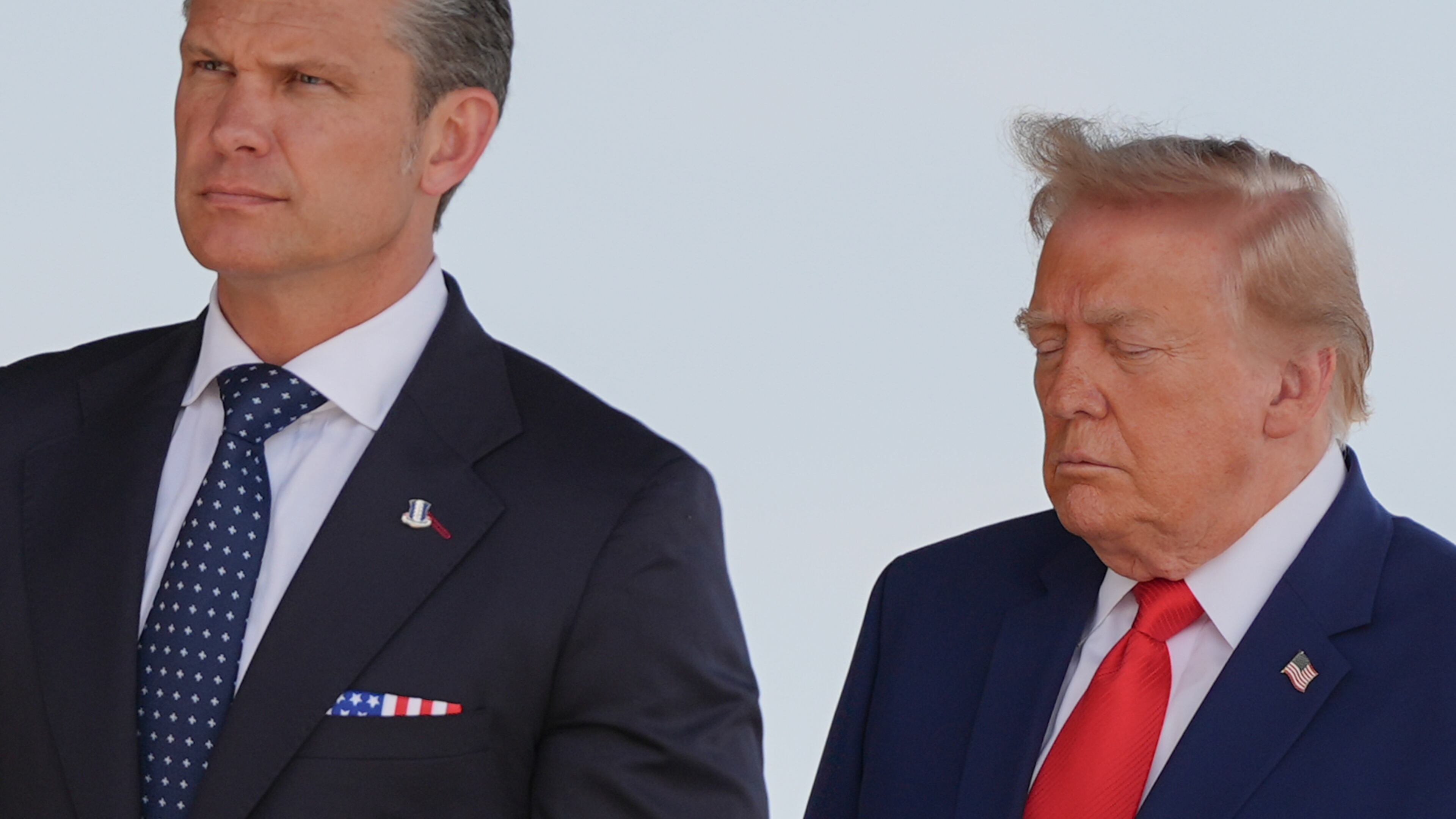 Defense Secretary Pete Hegseth and President Donald Trump attend the dignified transfer of four U.S. service members recently killed in the Middle East, Wednesday, July 22, 2026, at Dover Air Force Base, Del. (AP Photo/Julia Demaree Nikhinson)